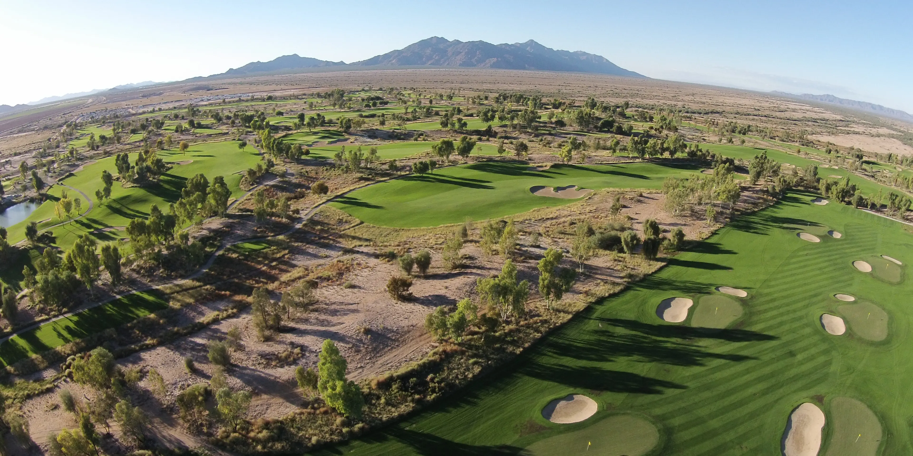Landscape putting greens and fairway photo of the Ak-Chin Southern Dunes Golf Club golf course