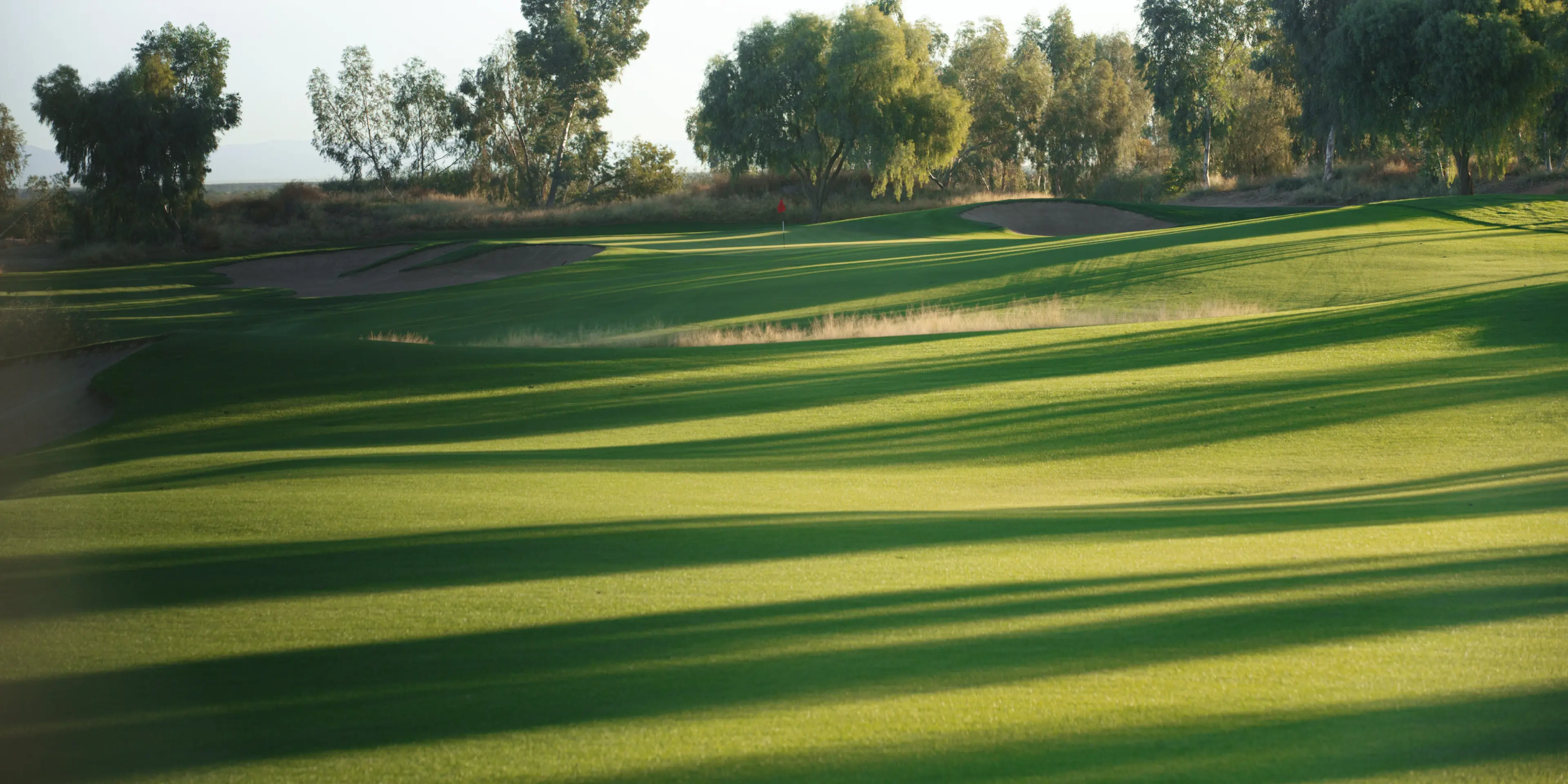 Landscape putting greens and fairway photo of the Ak-Chin Southern Dunes Golf Club golf course