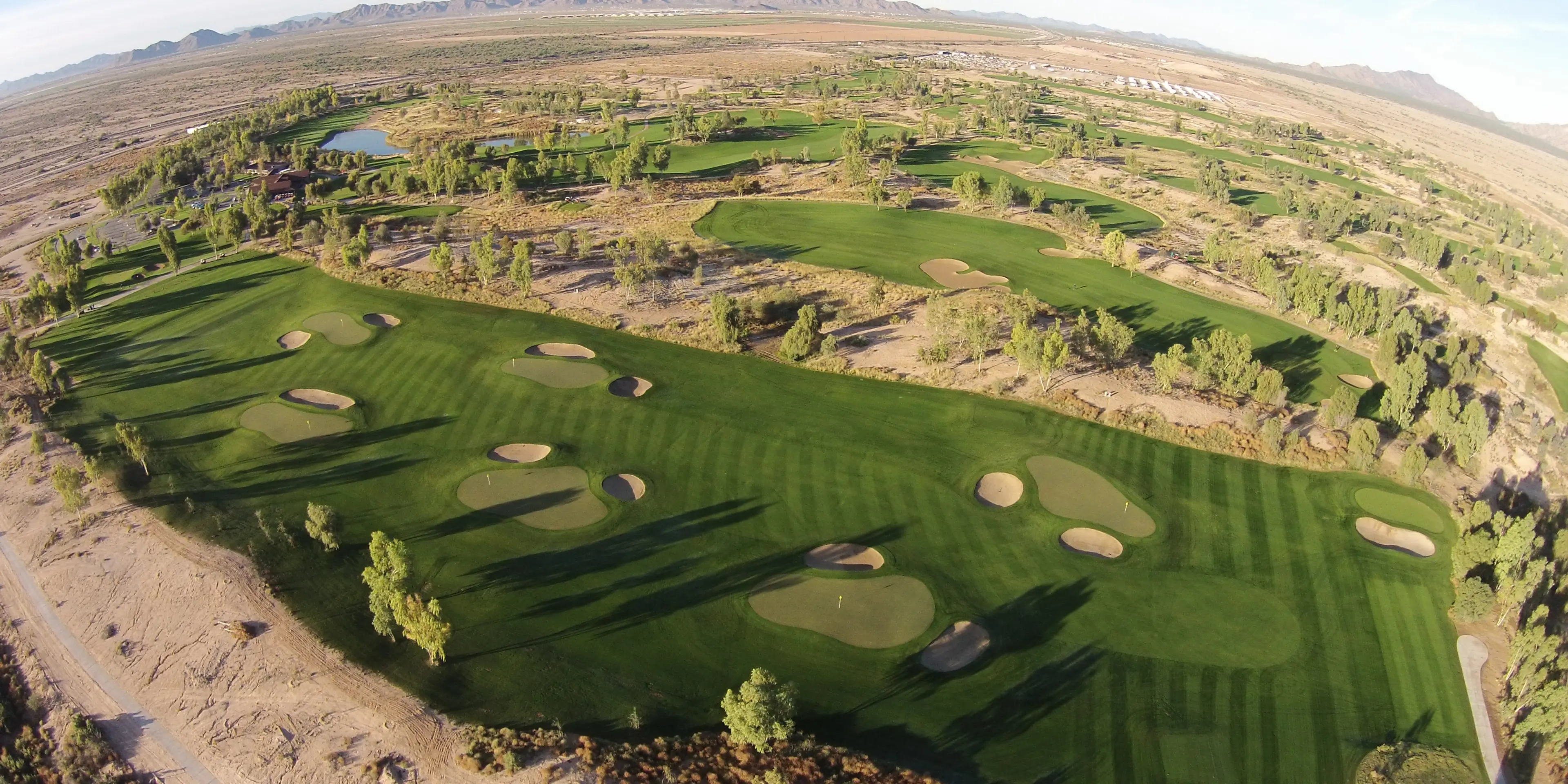Landscape putting greens and fairway photo of the Ak-Chin Southern Dunes Golf Club golf course
