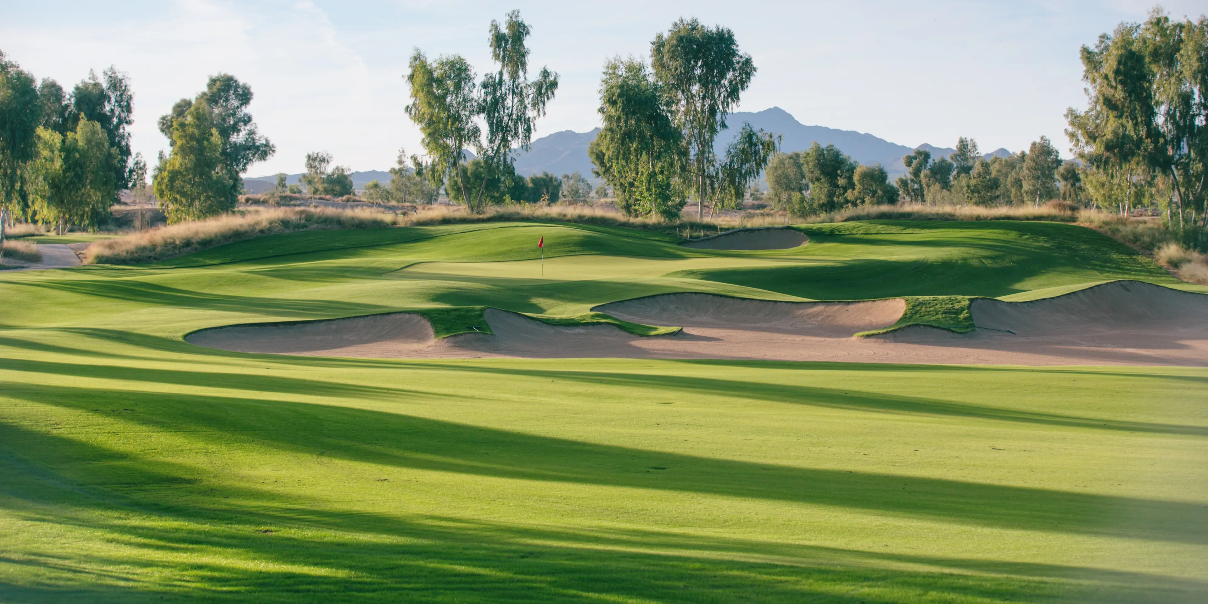 Landscape putting greens and fairway photo of the Ak-Chin Southern Dunes Golf Club golf course