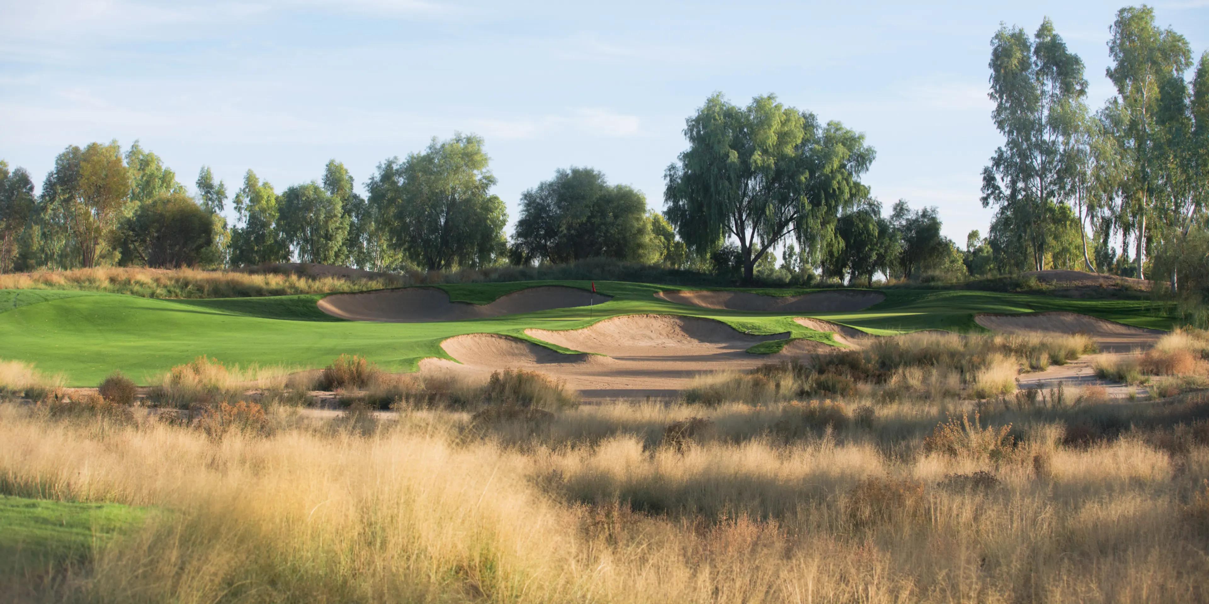 Landscape putting greens and fairway photo of the Ak-Chin Southern Dunes Golf Club golf course