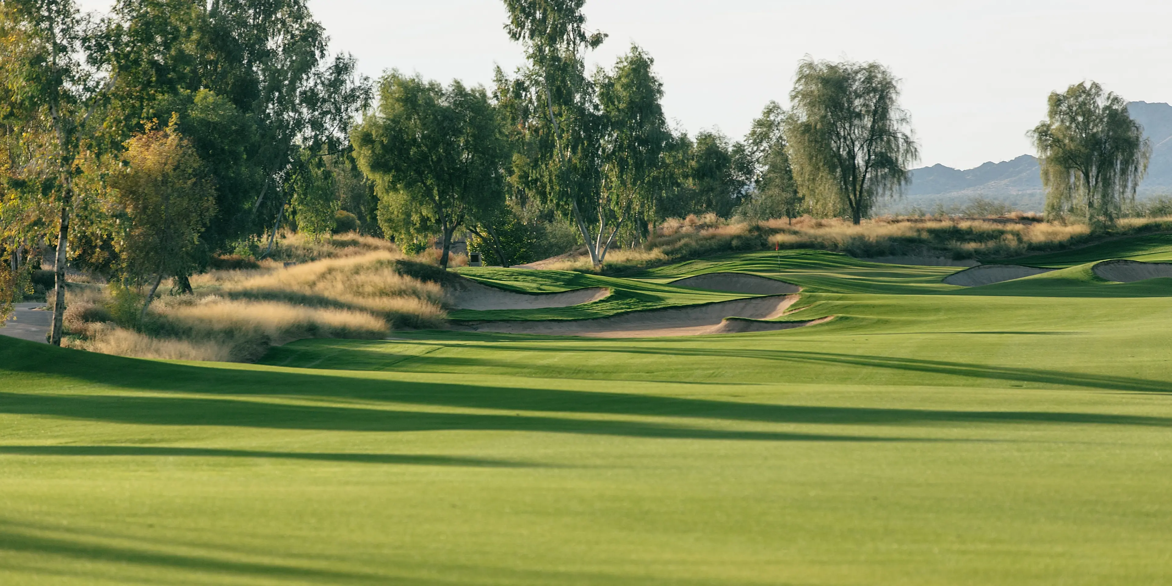 Landscape putting greens and fairway photo of the Ak-Chin Southern Dunes Golf Club golf course