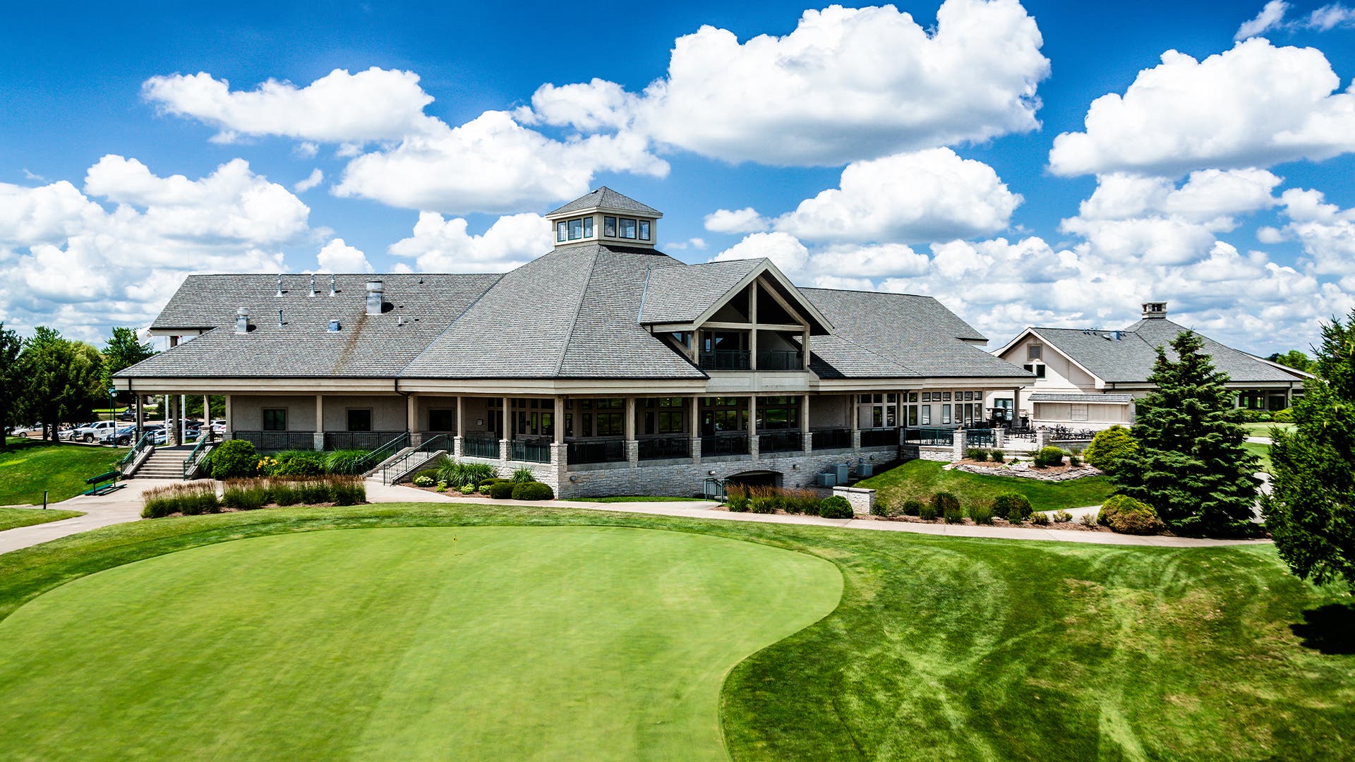 Landscape putting greens and fairway photo of the Atkins Golf Club golf course