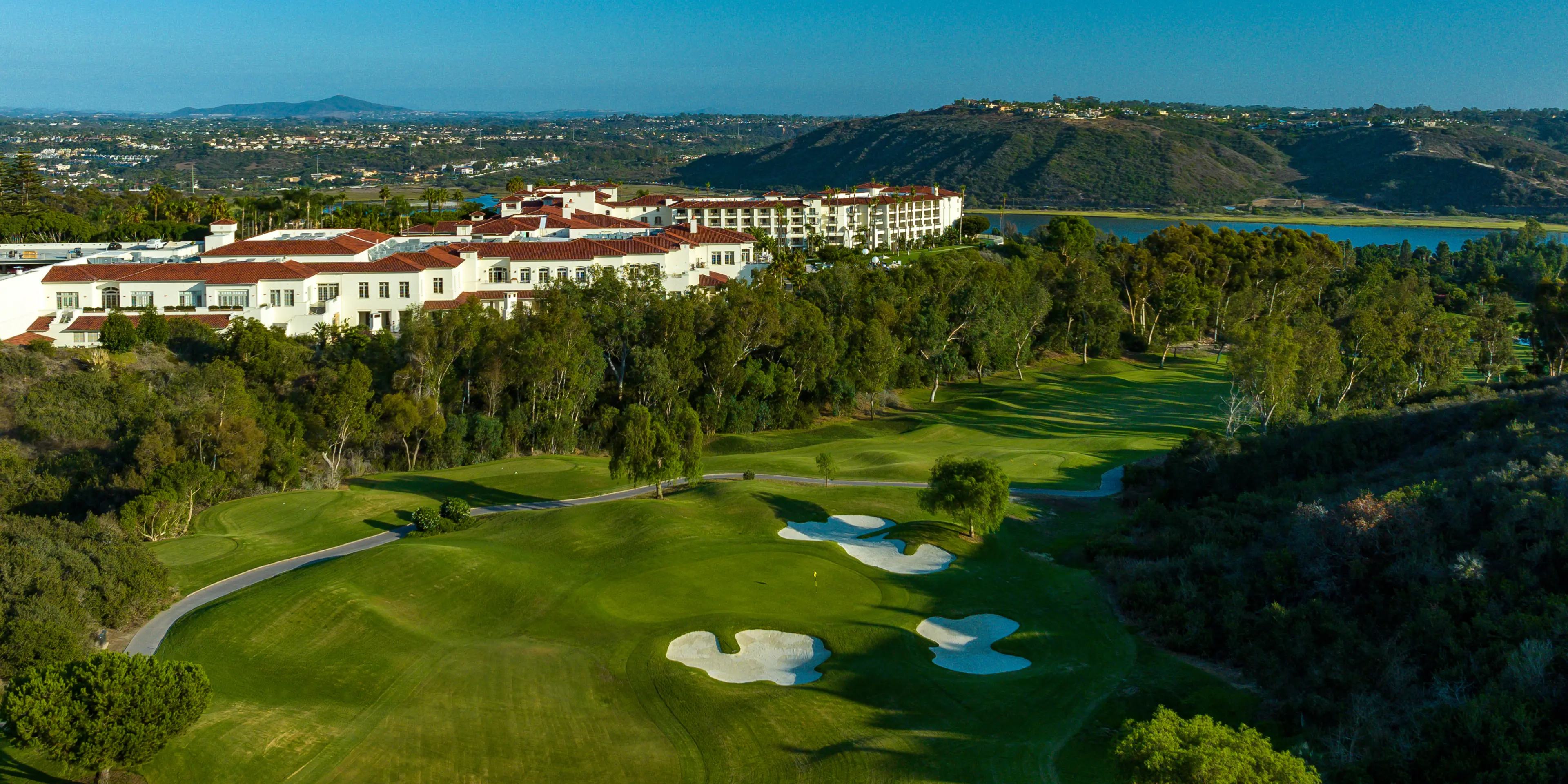 Landscape putting greens and fairway photo of the Aviara Golf Club golf course