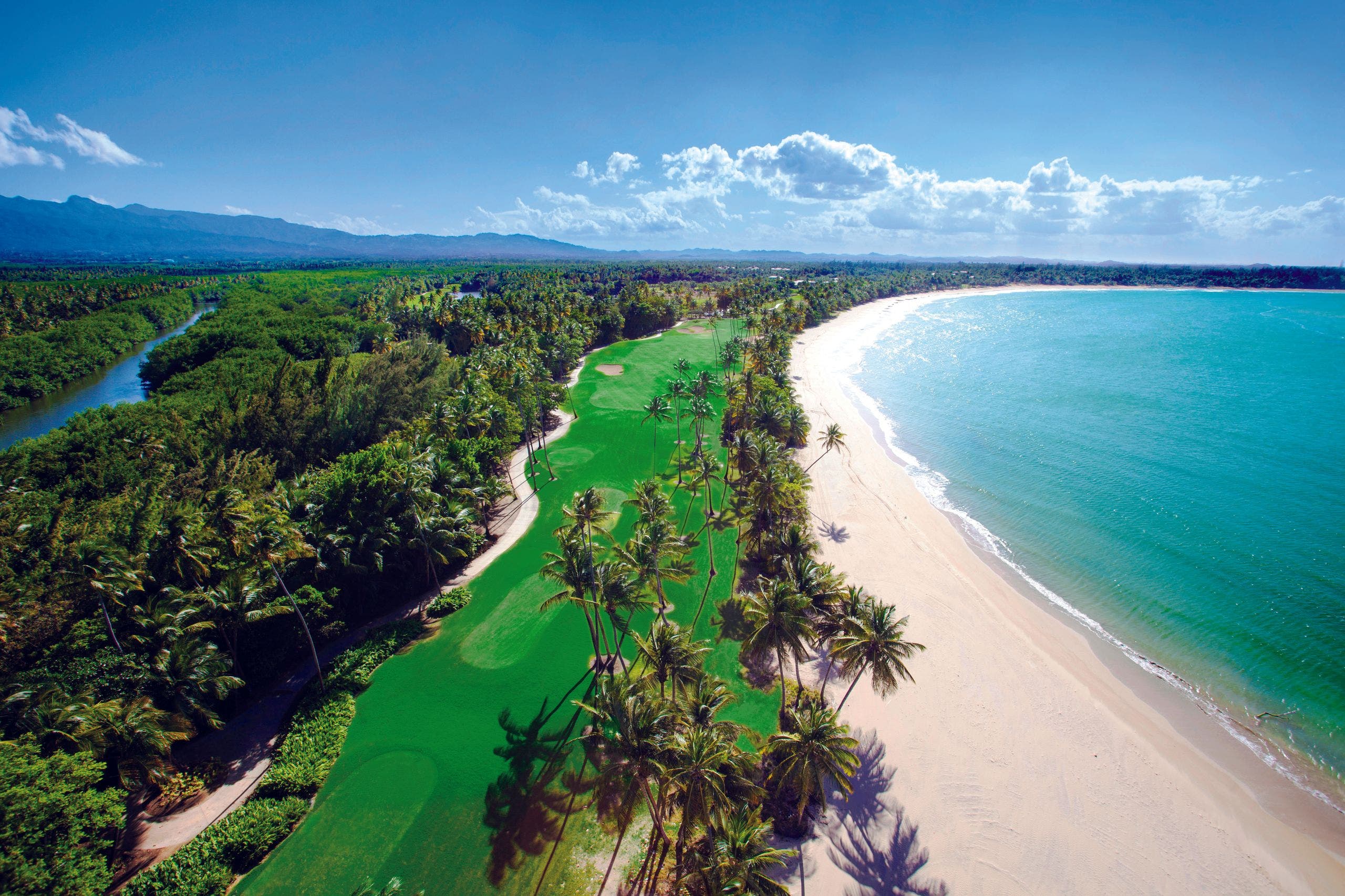 Landscape putting greens and fairway photo of the Bahia Beach Resort & Golf Club golf course