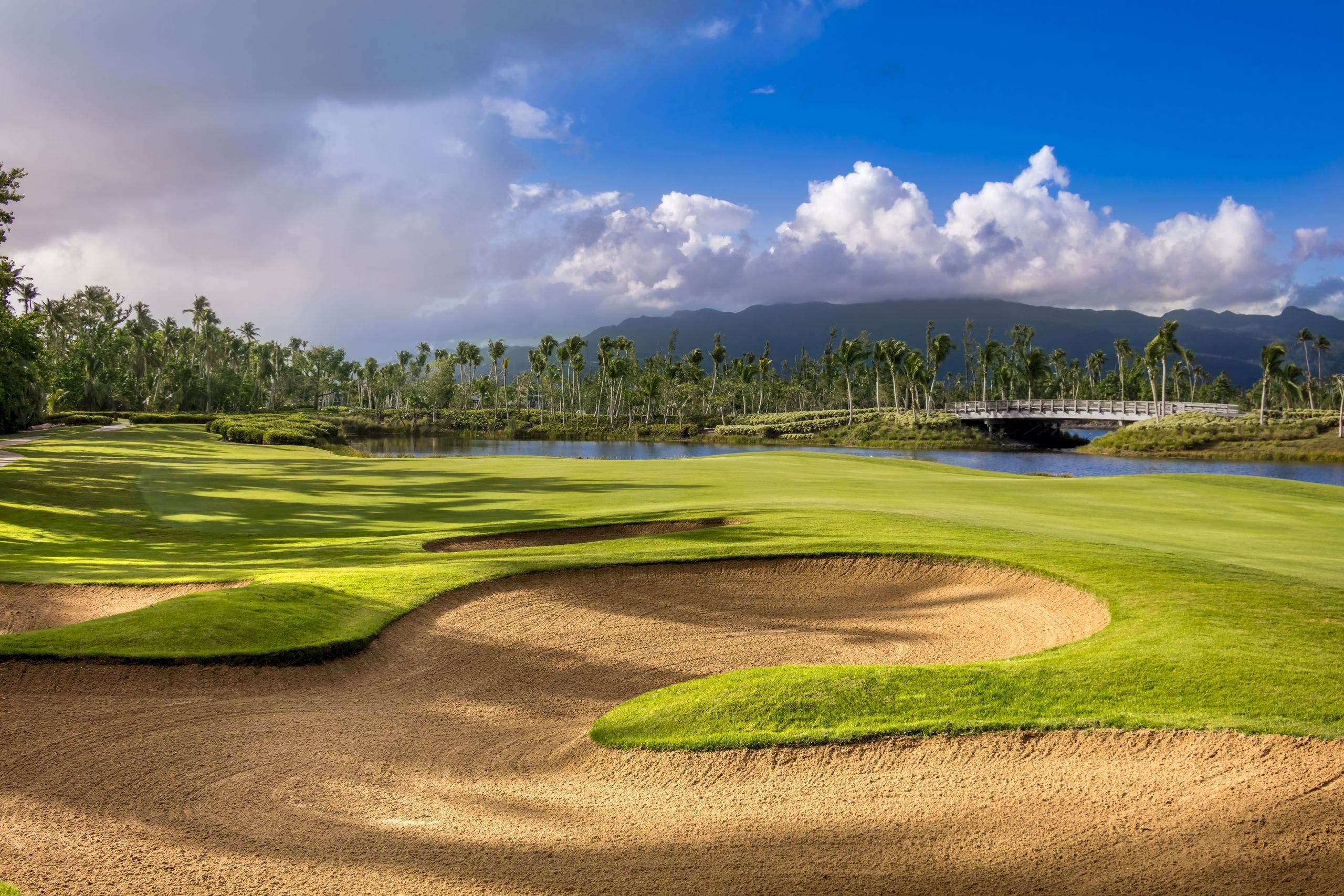 Landscape putting greens and fairway photo of the Bahia Beach Resort & Golf Club golf course