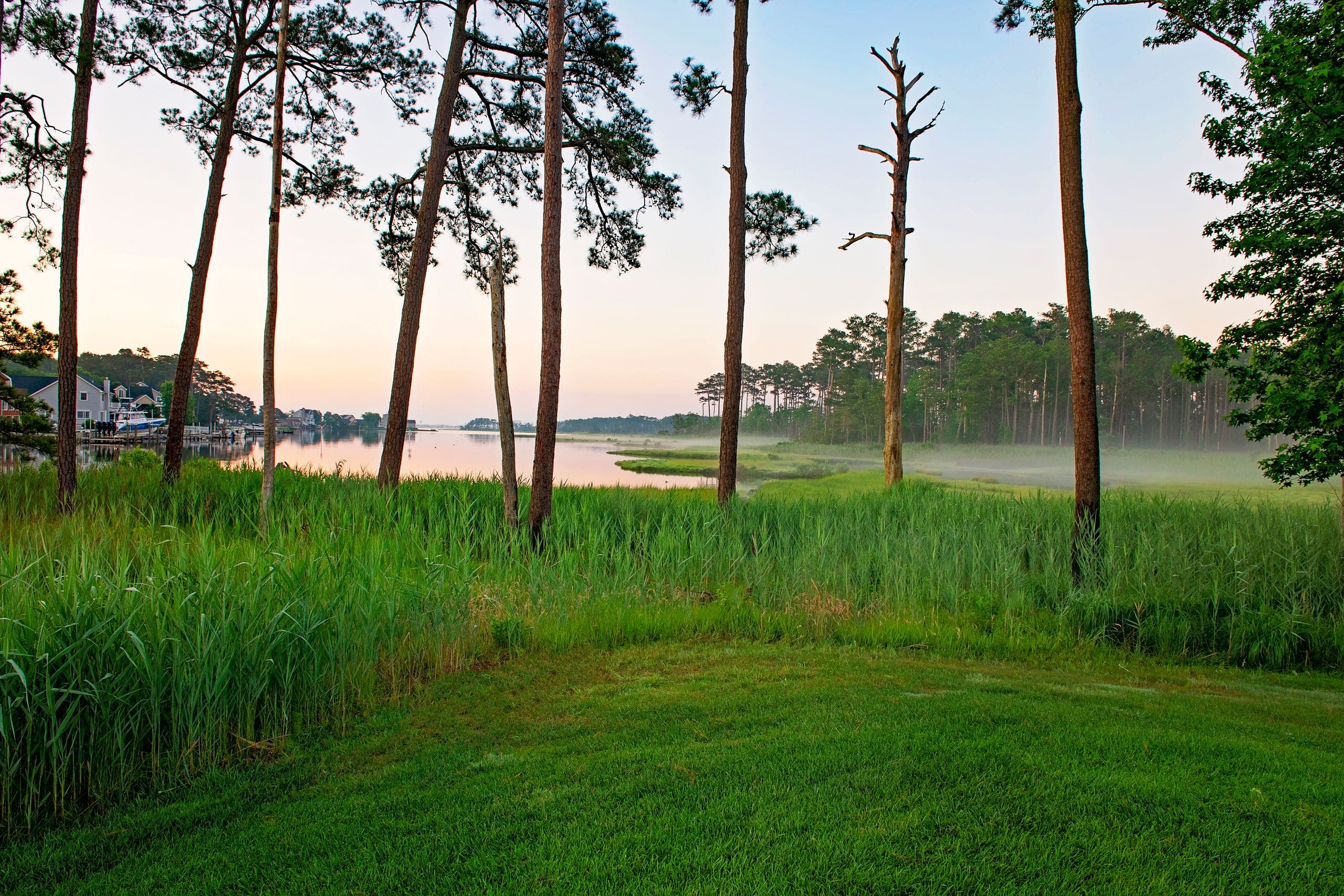 Landscape putting greens and fairway photo of the Bayside Resort Golf Club golf course