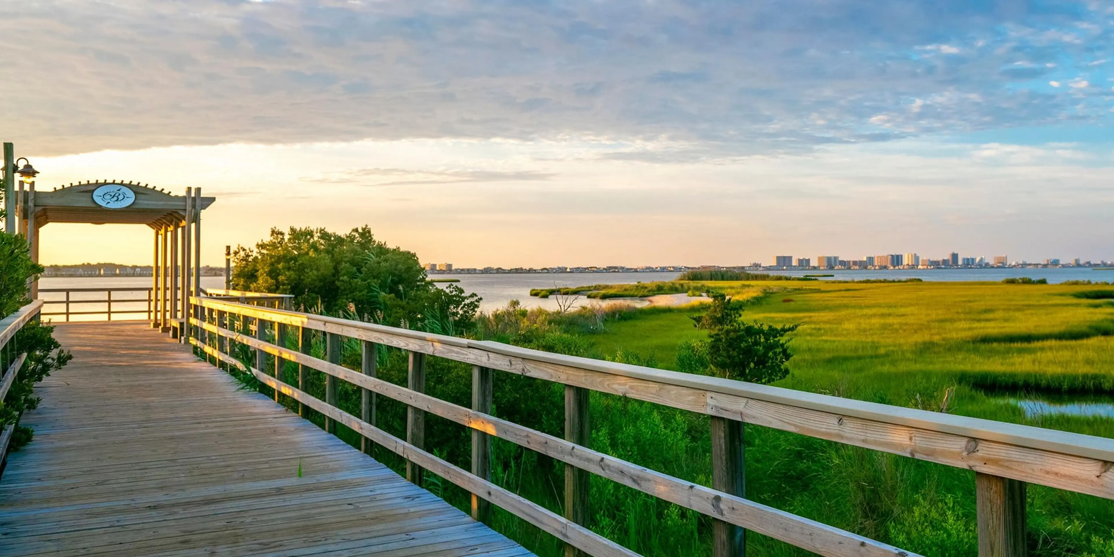 Landscape putting greens and fairway photo of the Bayside Resort Golf Club golf course