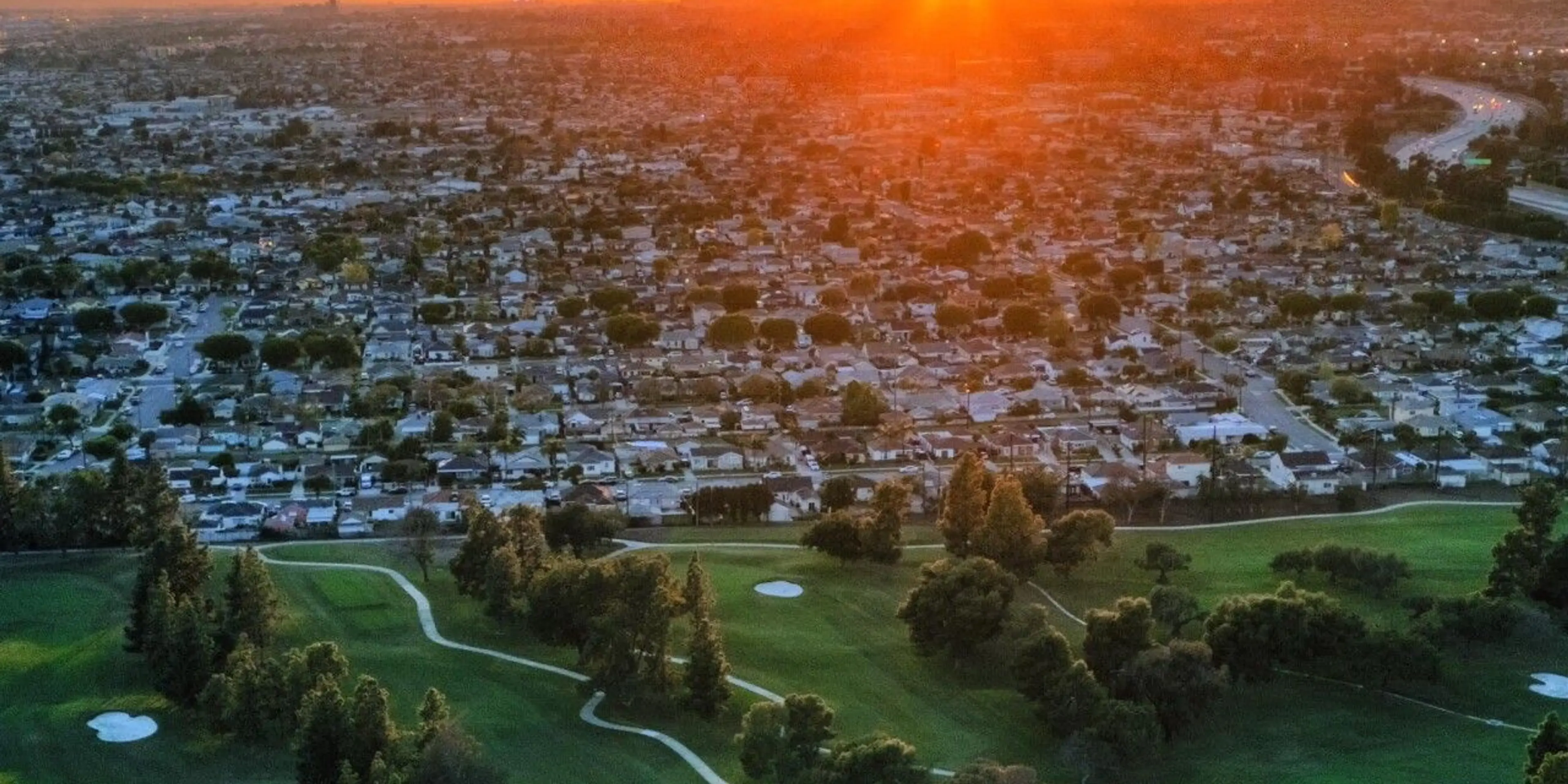 Landscape putting greens and fairway photo of the Bella Verde Golf Club golf course