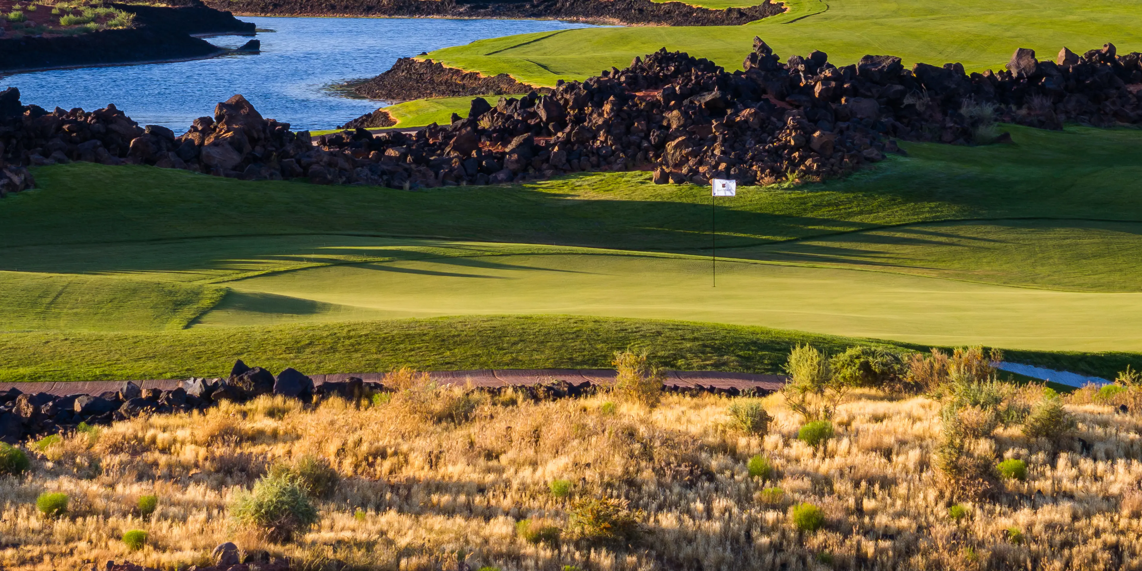 Landscape putting greens and fairway photo of the Black Desert golf course