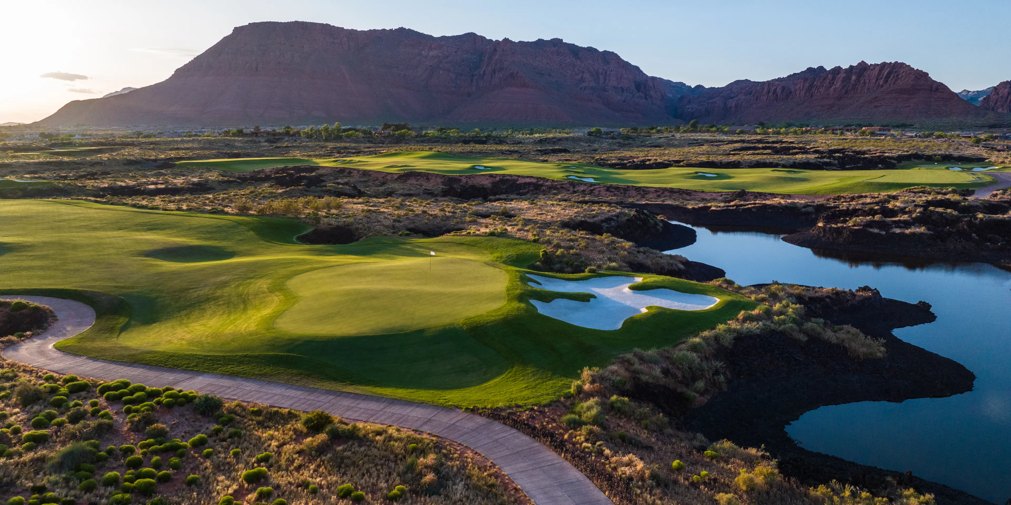 Landscape putting greens and fairway photo of the Black Desert golf course