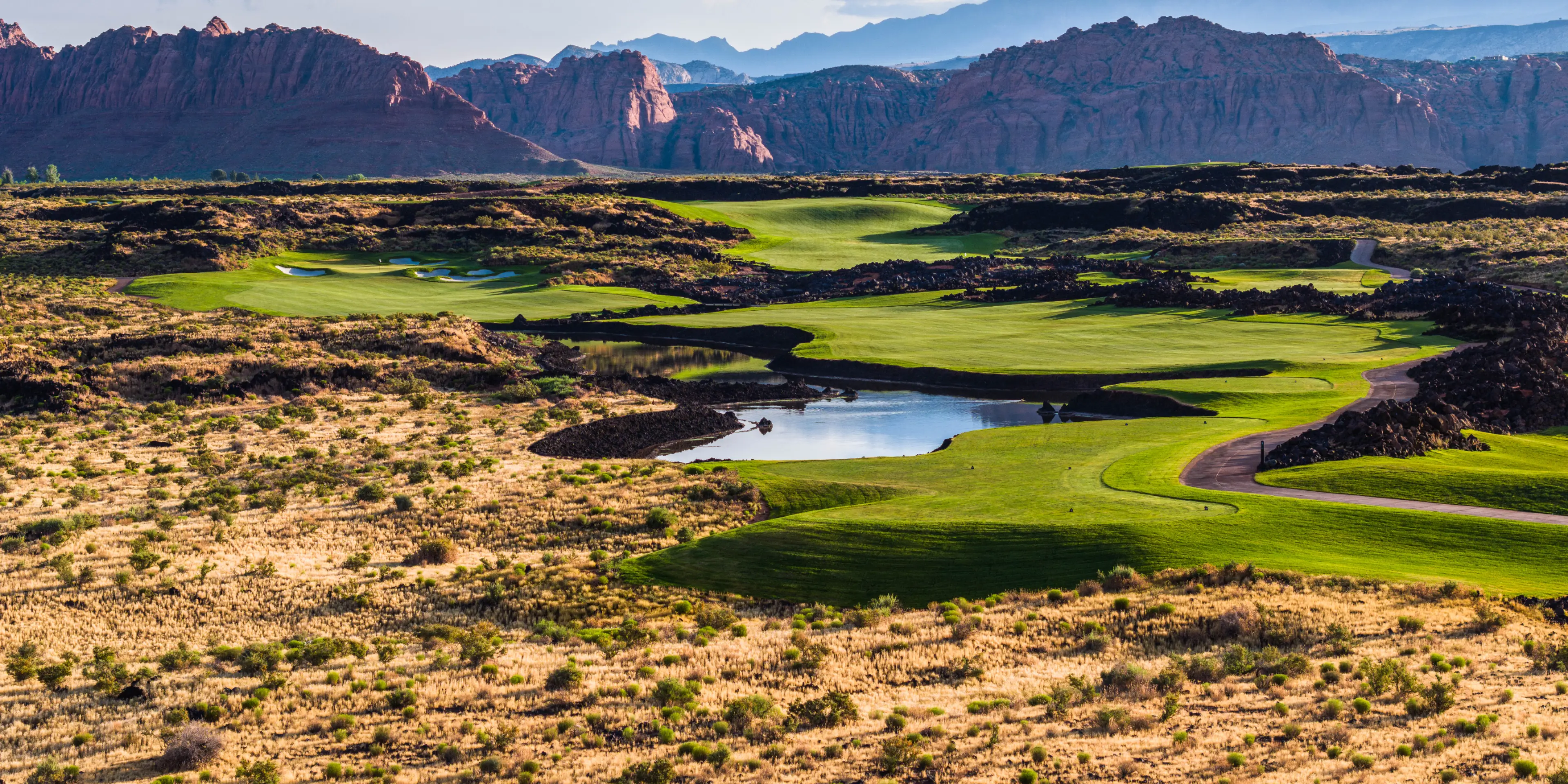 Landscape putting greens and fairway photo of the Black Desert golf course