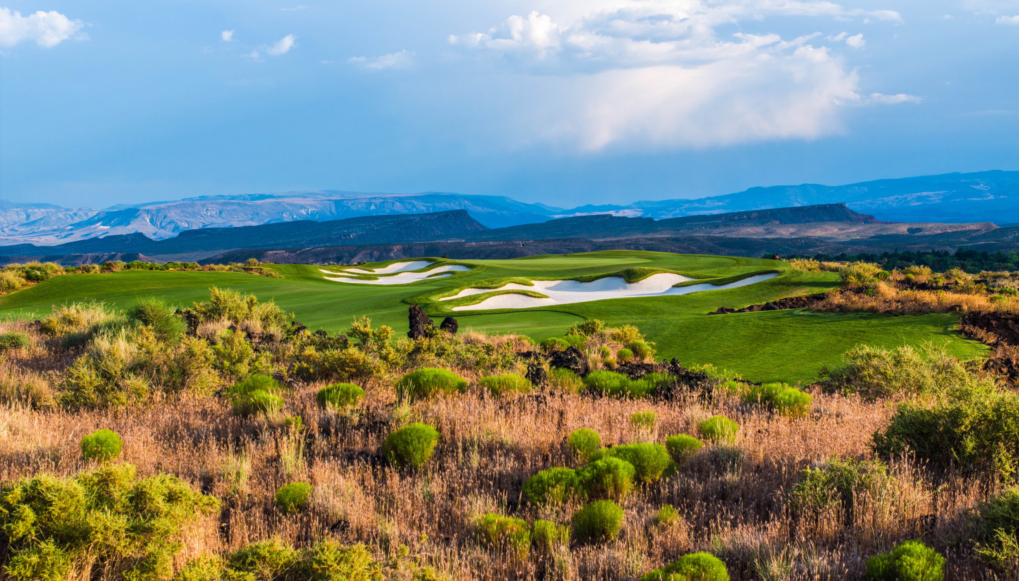 Landscape putting greens and fairway photo of the Black Desert golf course