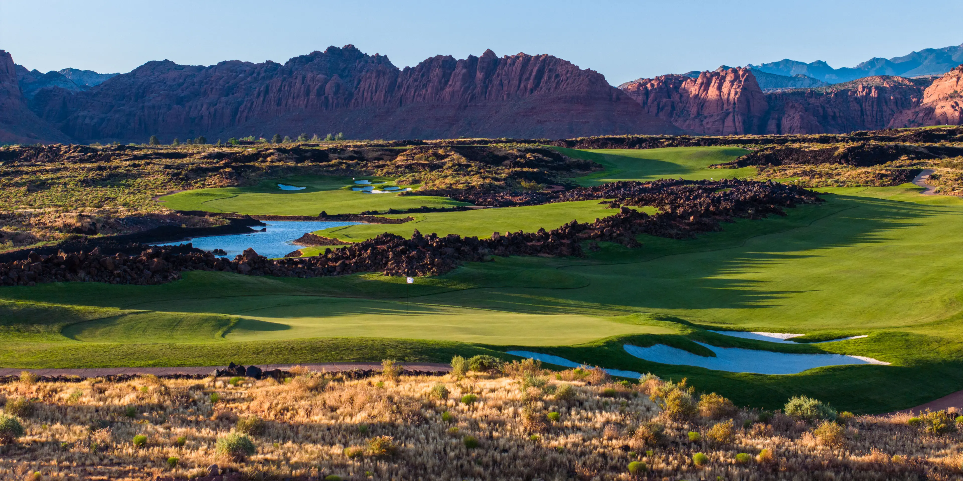 Landscape putting greens and fairway photo of the Black Desert golf course