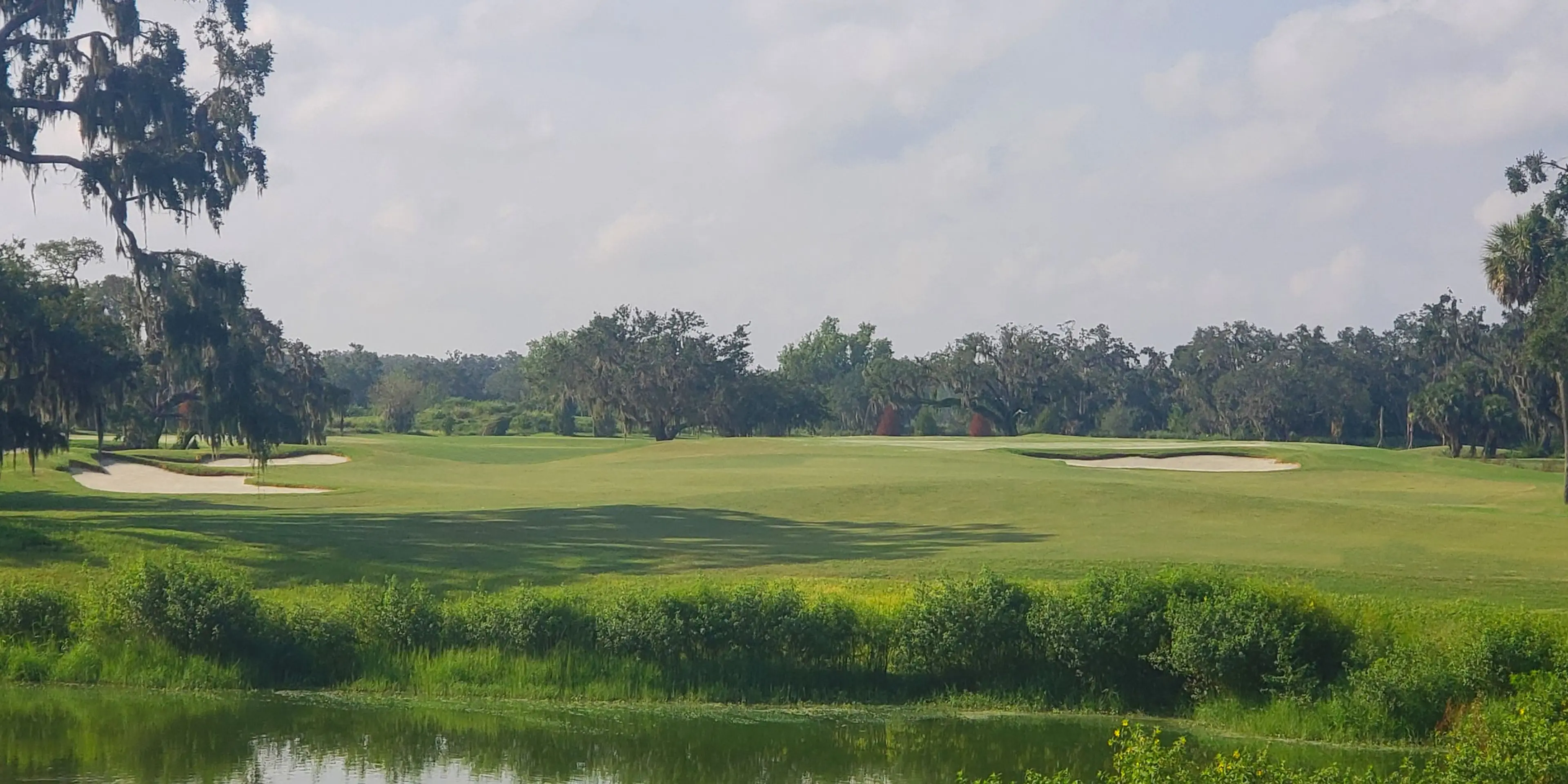 Landscape putting greens and fairway photo of the Bobby Jones Golf Club golf course