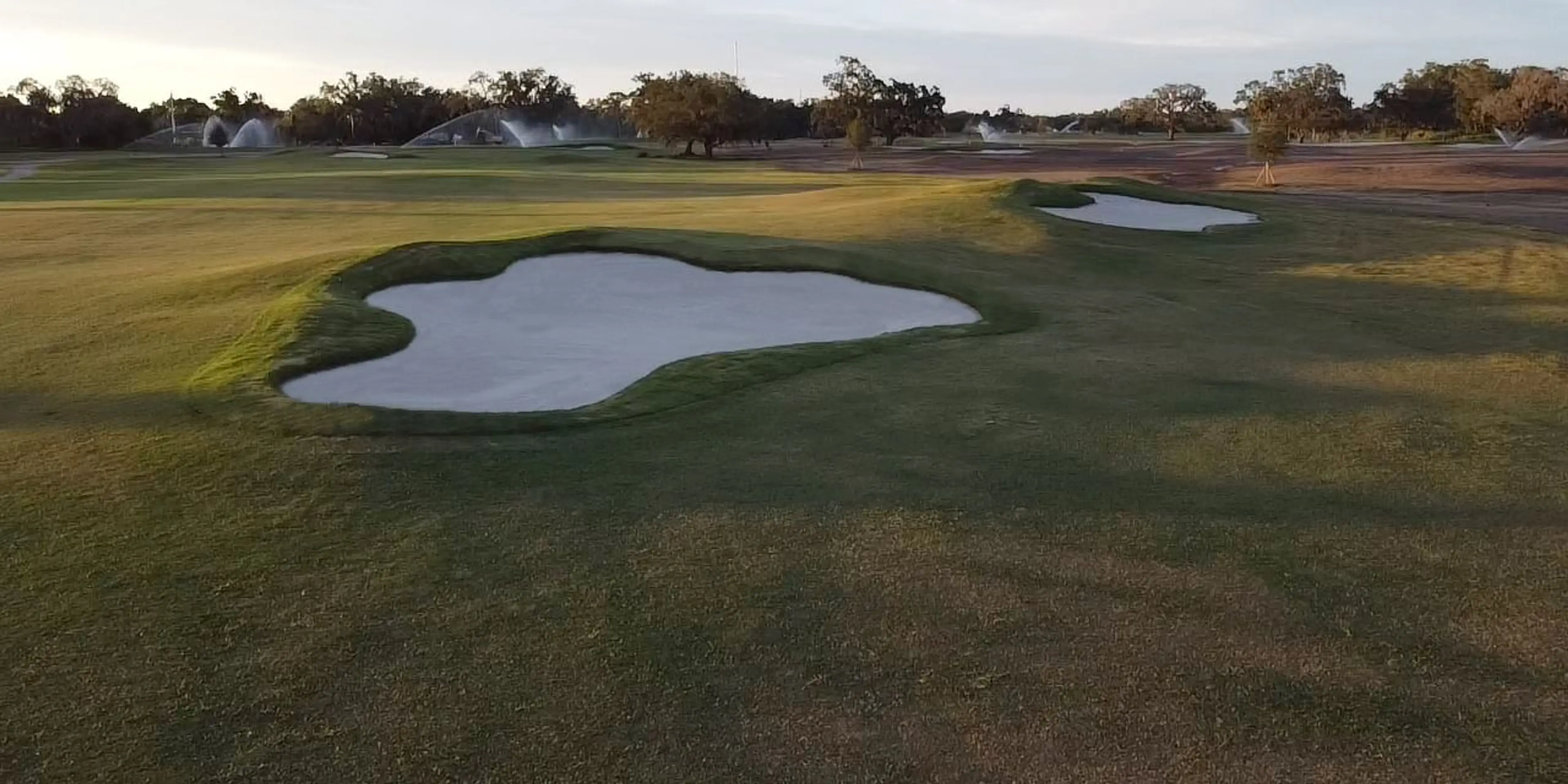 Landscape putting greens and fairway photo of the Bobby Jones Golf Club golf course