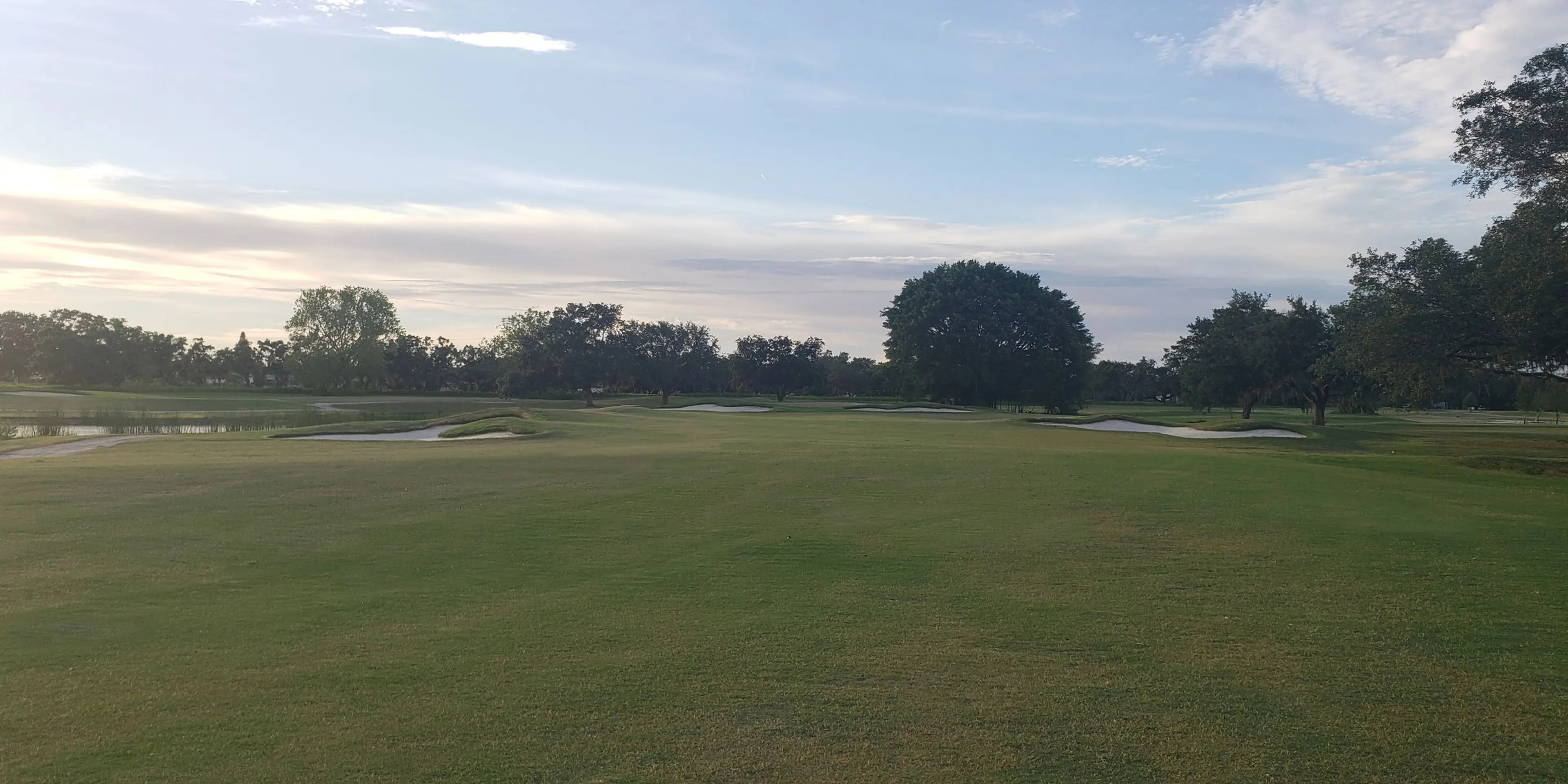 Landscape putting greens and fairway photo of the Bobby Jones Golf Club golf course