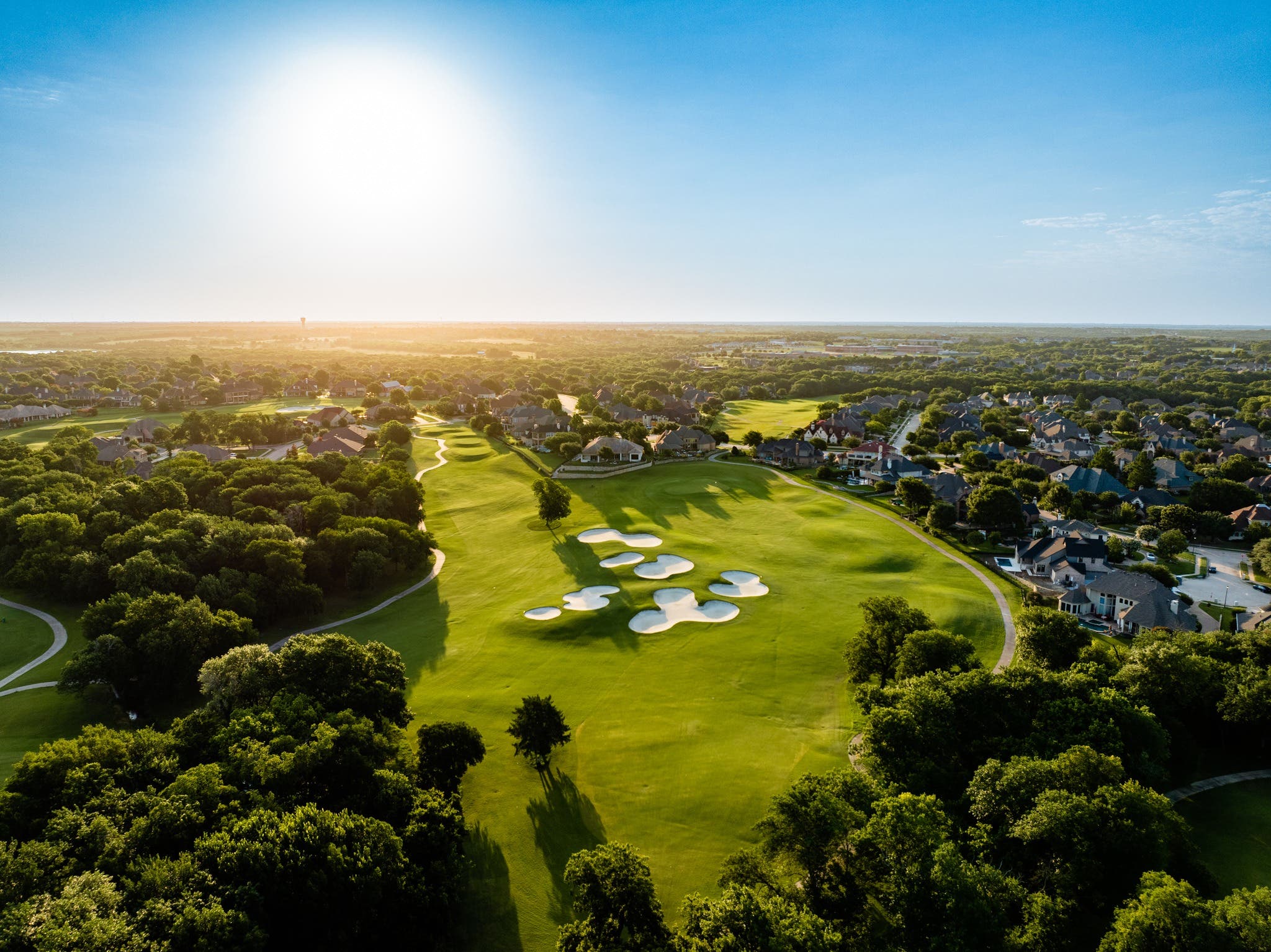 Landscape putting greens and fairway photo of the Buffalo Creek Golf Club golf course