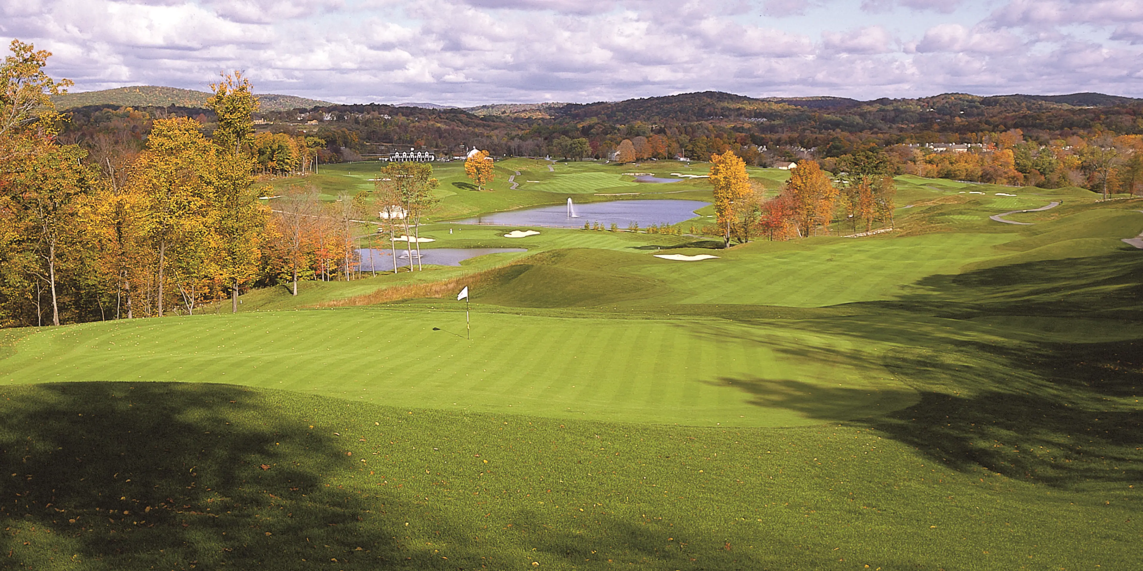 Landscape putting greens and fairway photo of the Centennial Golf Club golf course