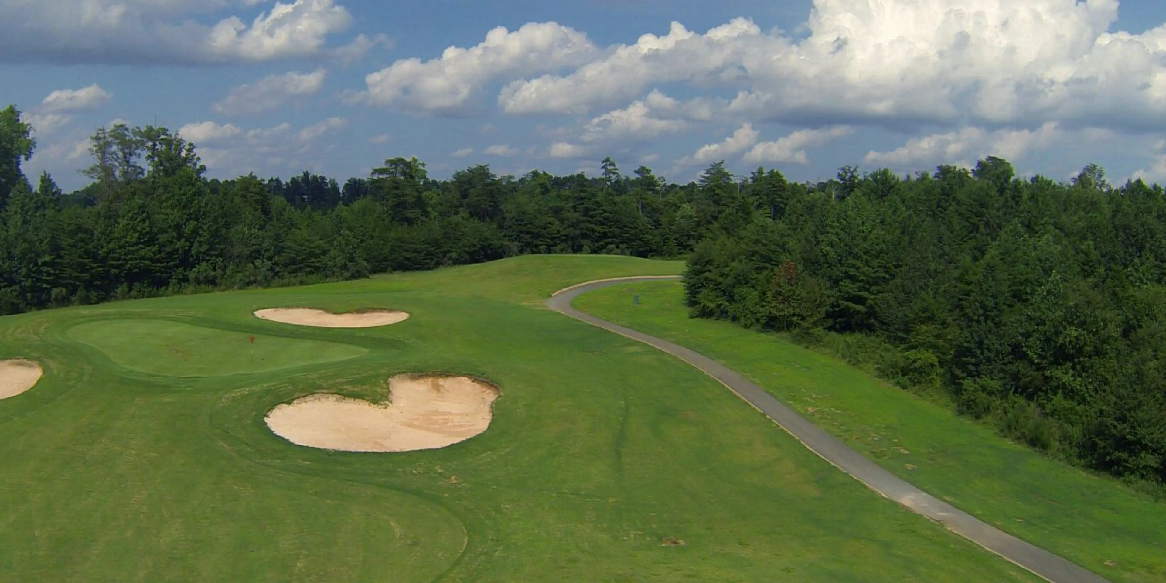Landscape putting greens and fairway photo of the Charles T Myers Golf Course golf course