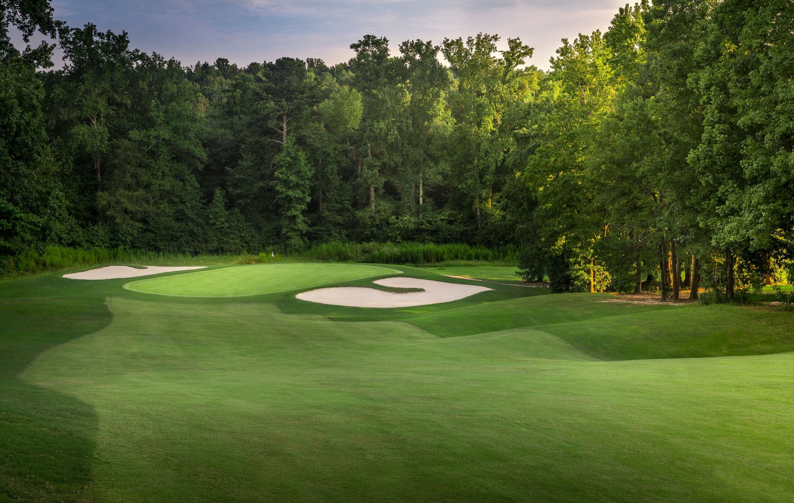 Landscape putting greens and fairway photo of the Chateau Elan Golf Club golf course