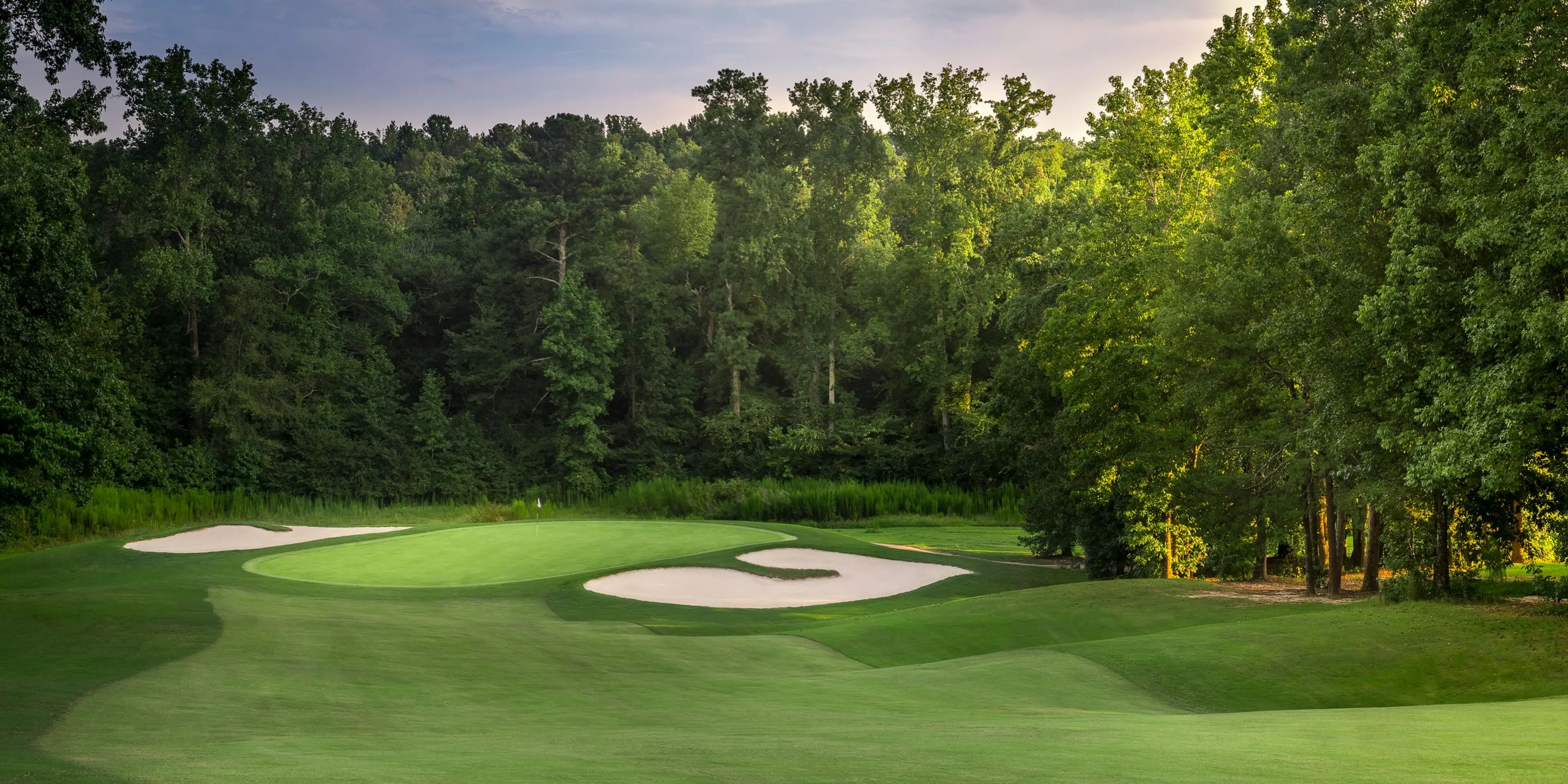 Landscape putting greens and fairway photo of the Chateau Elan Golf Club golf course