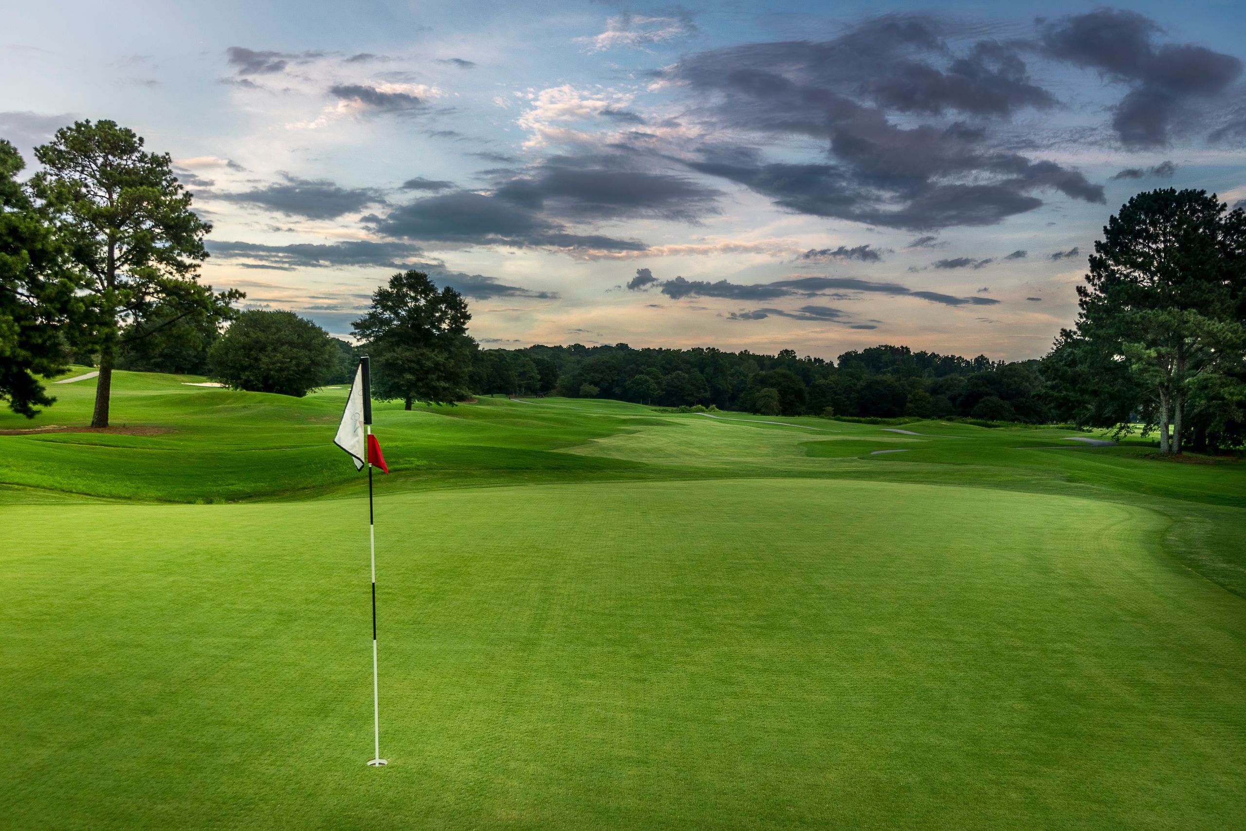 Landscape putting greens and fairway photo of the Chateau Elan Golf Club golf course