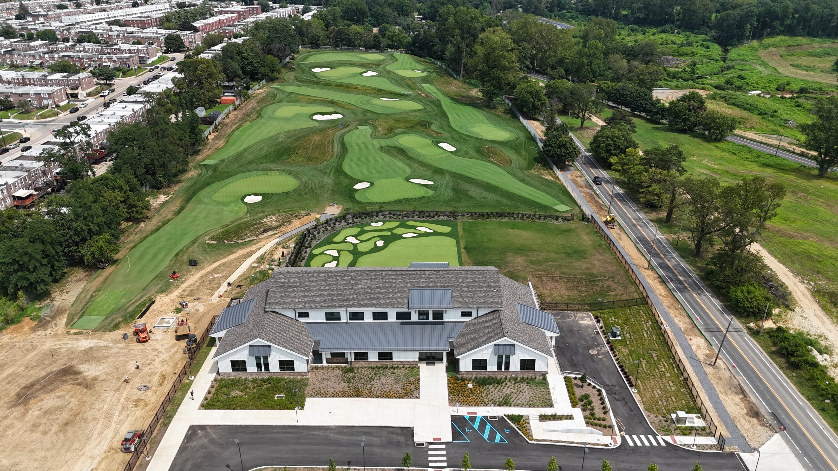 Landscape putting greens and fairway photo of the Cobbs Creek Golf Campus golf course