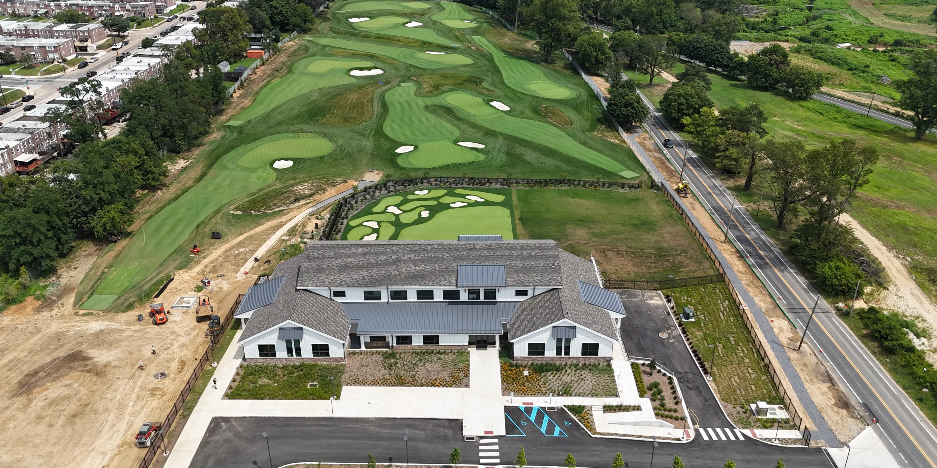 Landscape putting greens and fairway photo of the Cobbs Creek Golf Campus golf course