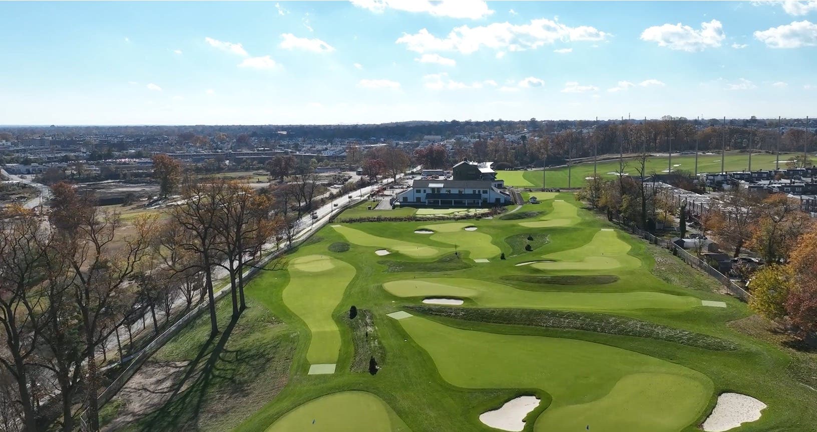 Landscape putting greens and fairway photo of the Cobbs Creek Golf Campus golf course