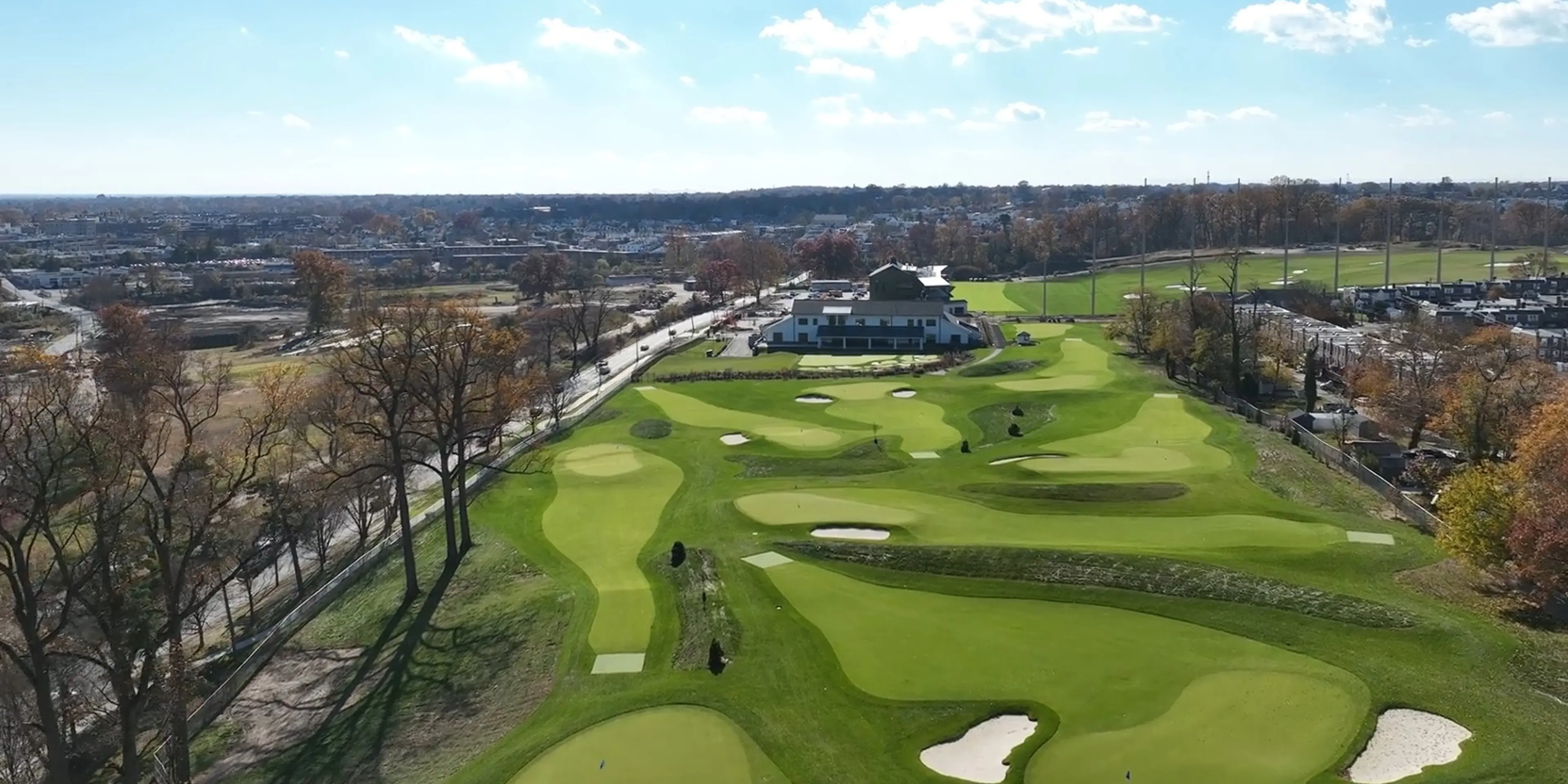 Landscape putting greens and fairway photo of the Cobbs Creek Golf Campus golf course