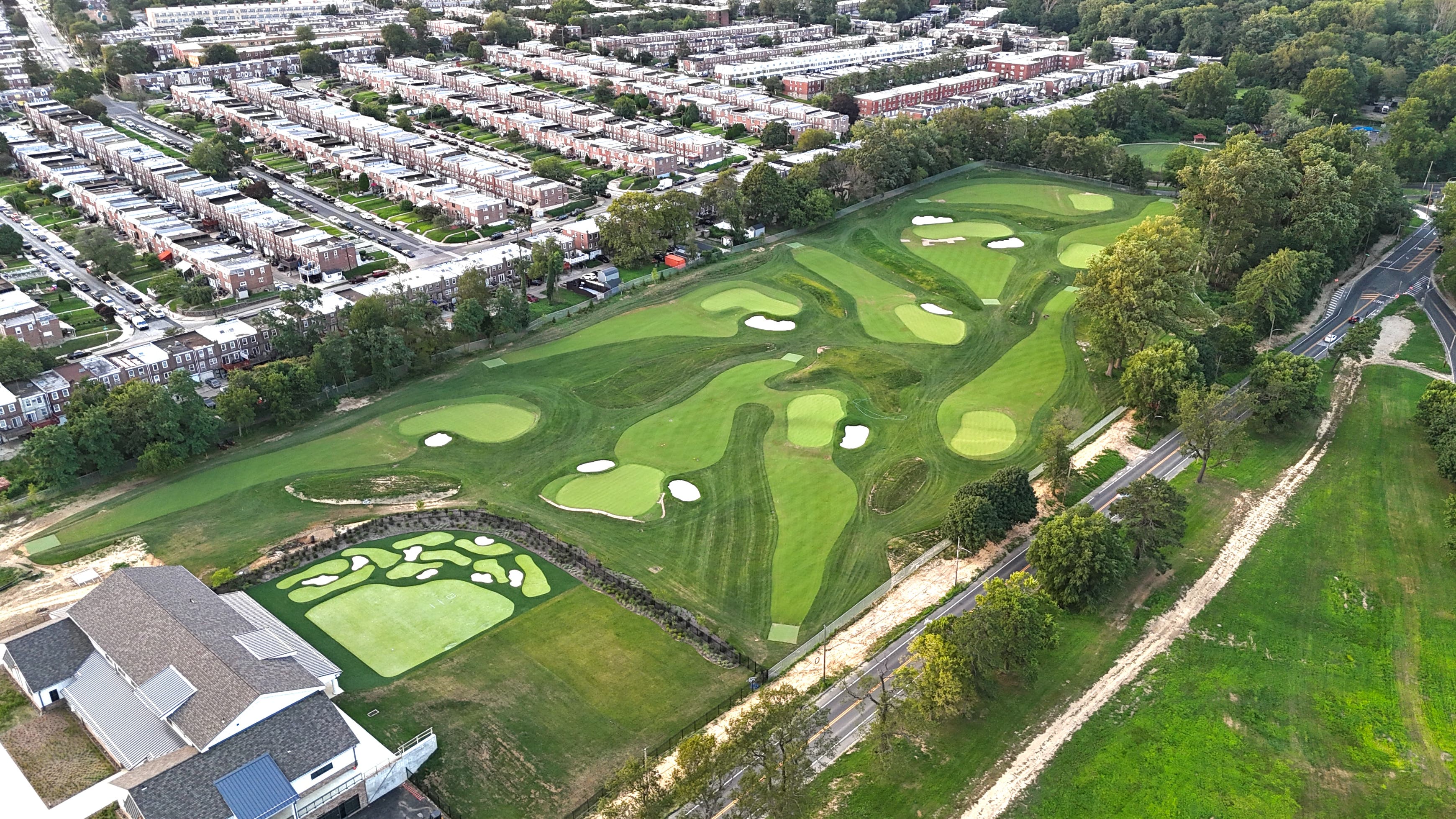 Landscape putting greens and fairway photo of the Cobbs Creek Golf Campus golf course