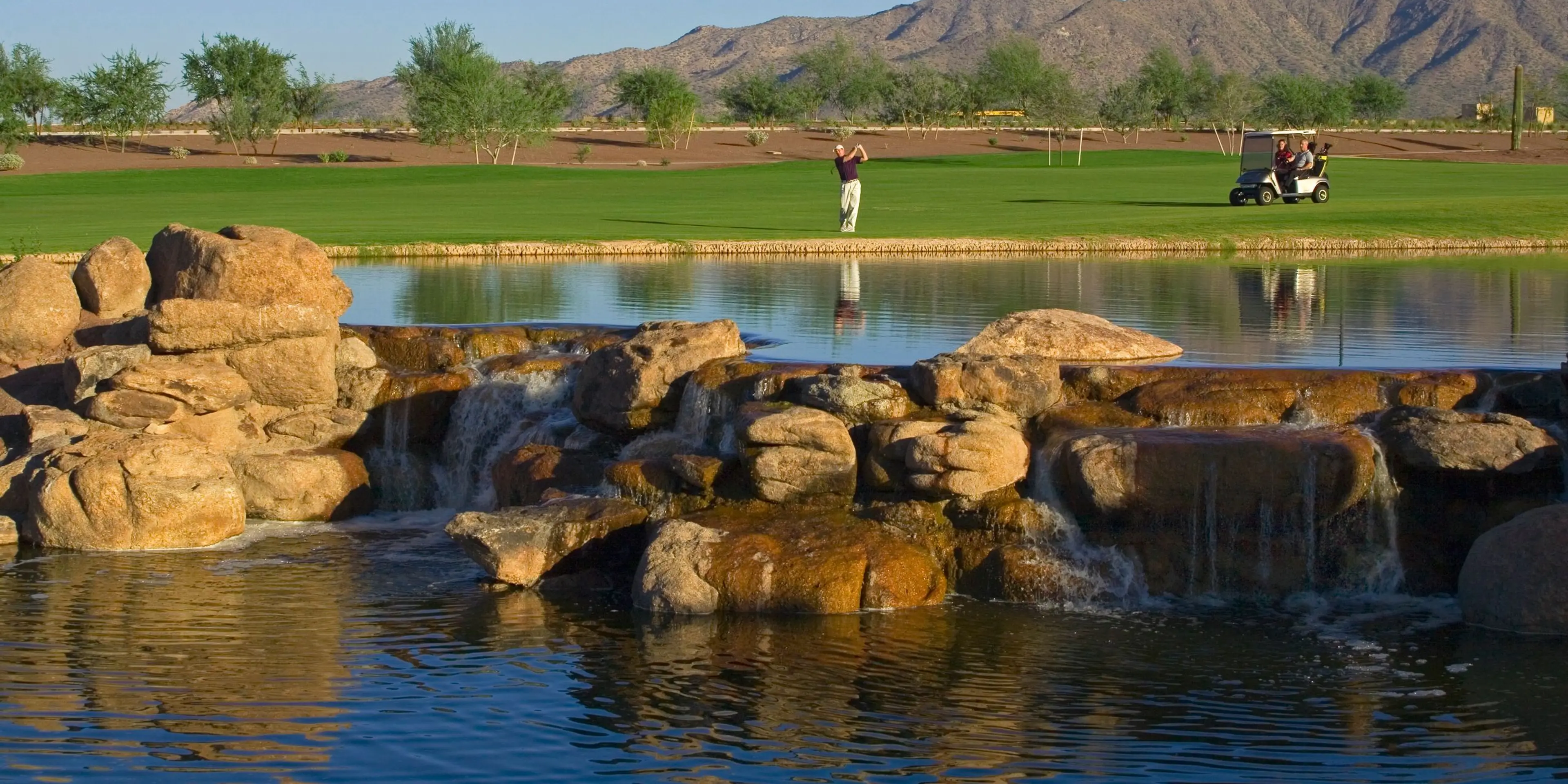 Landscape putting greens and fairway photo of the Copper Canyon Golf Club golf course