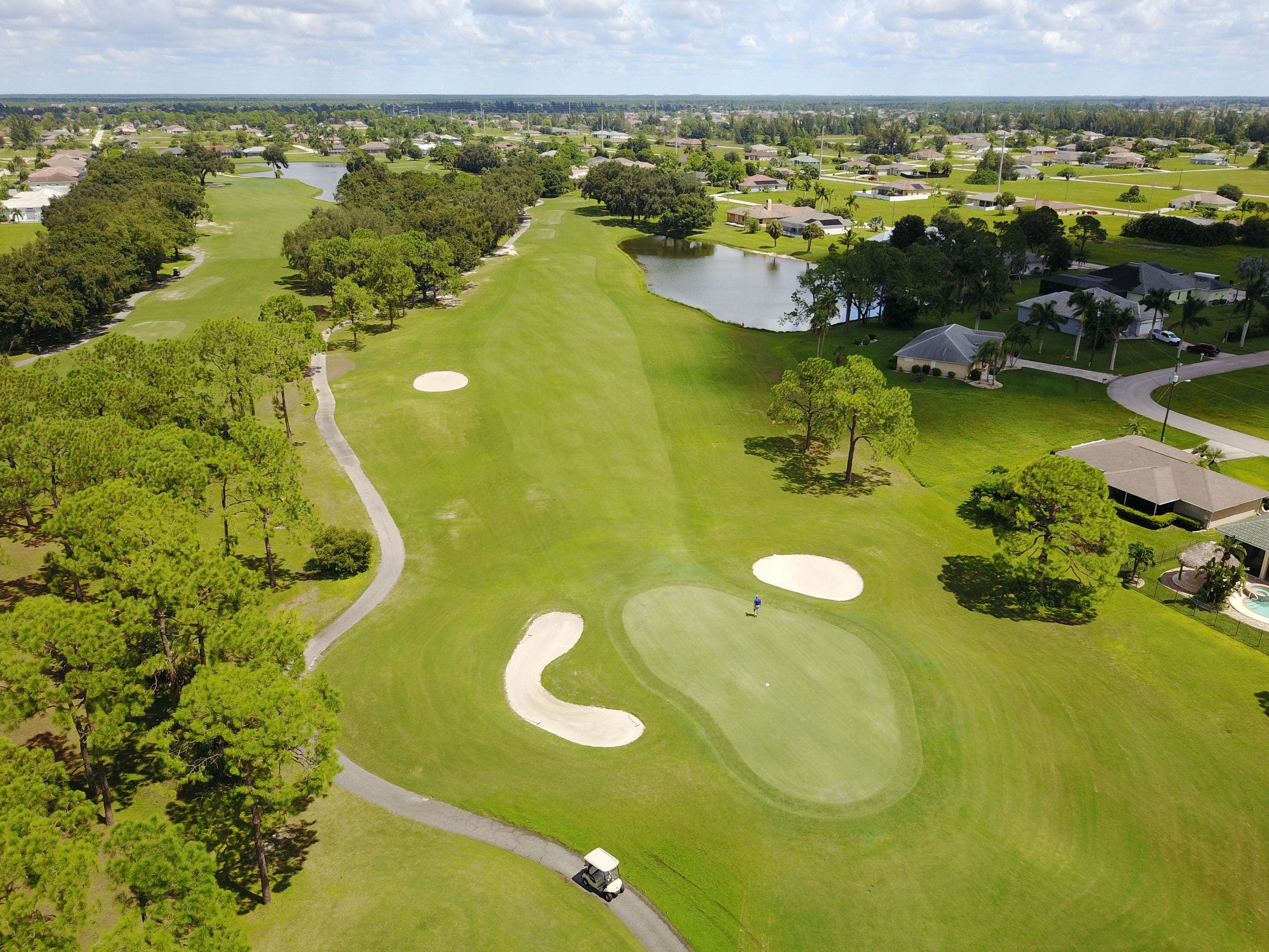 Landscape putting greens and fairway photo of the Coral Oaks Golf Course  golf course