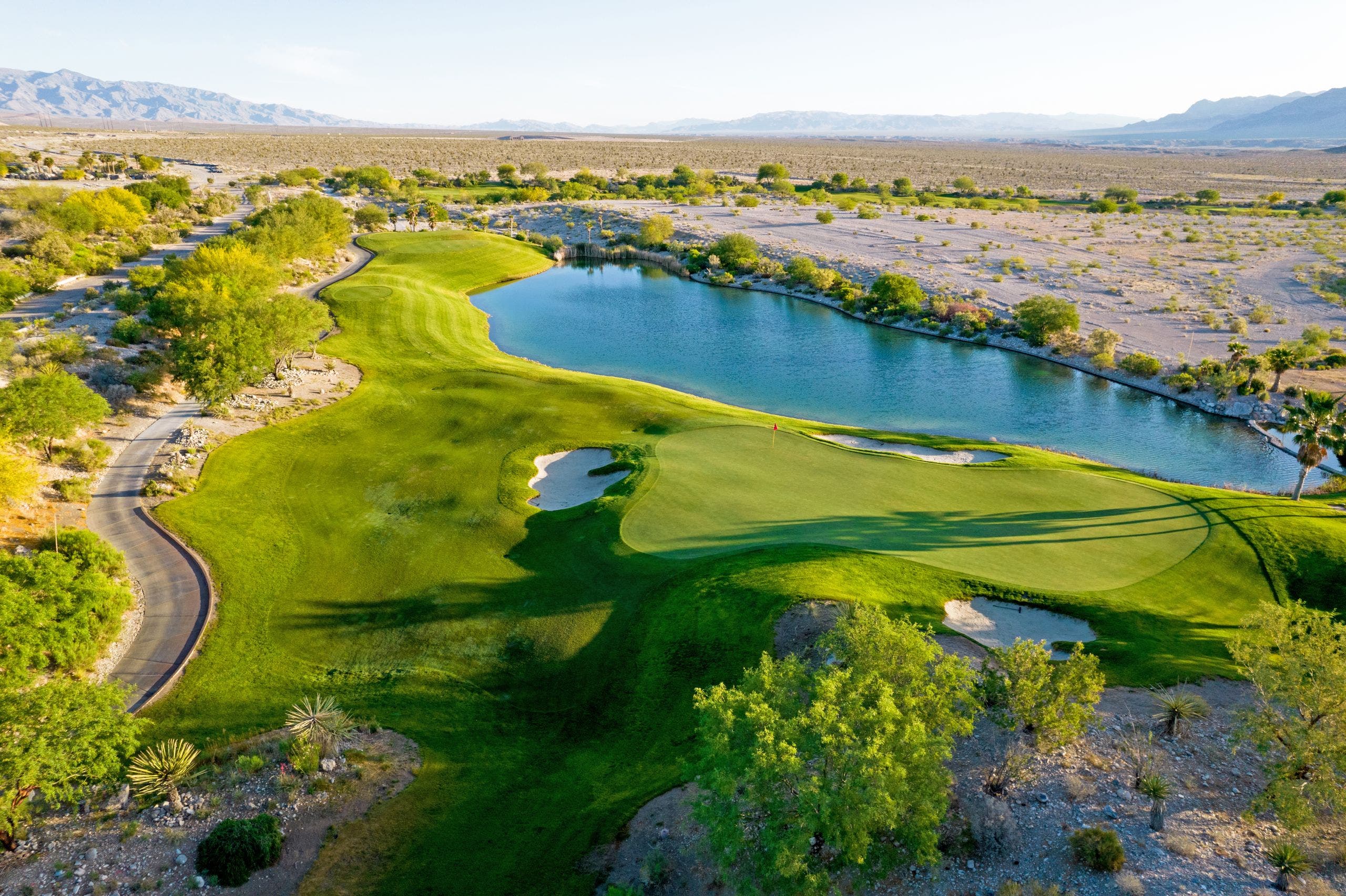 Landscape putting greens and fairway photo of the Coyote Springs Golf Club golf course