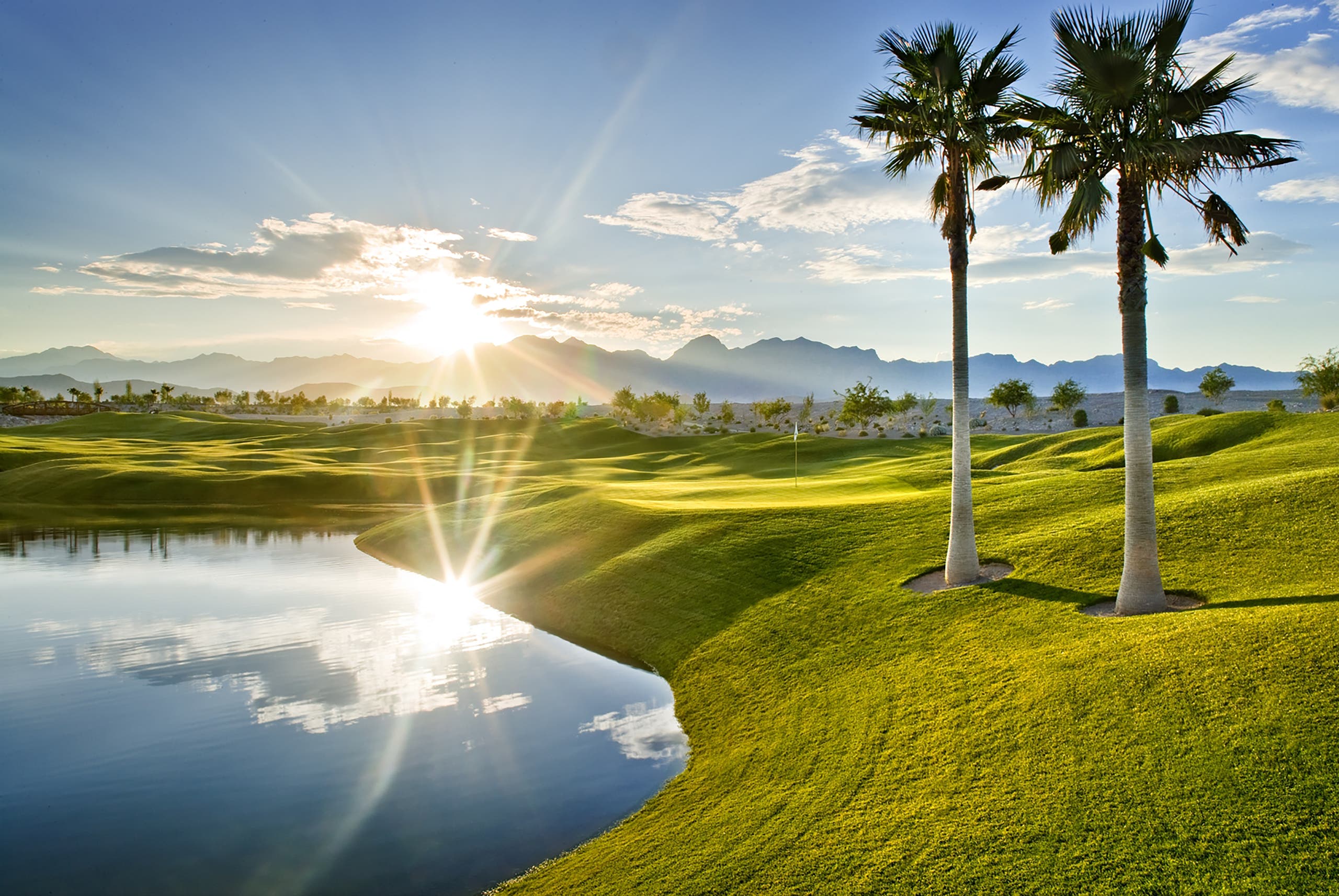 Landscape putting greens and fairway photo of the Coyote Springs Golf Club golf course