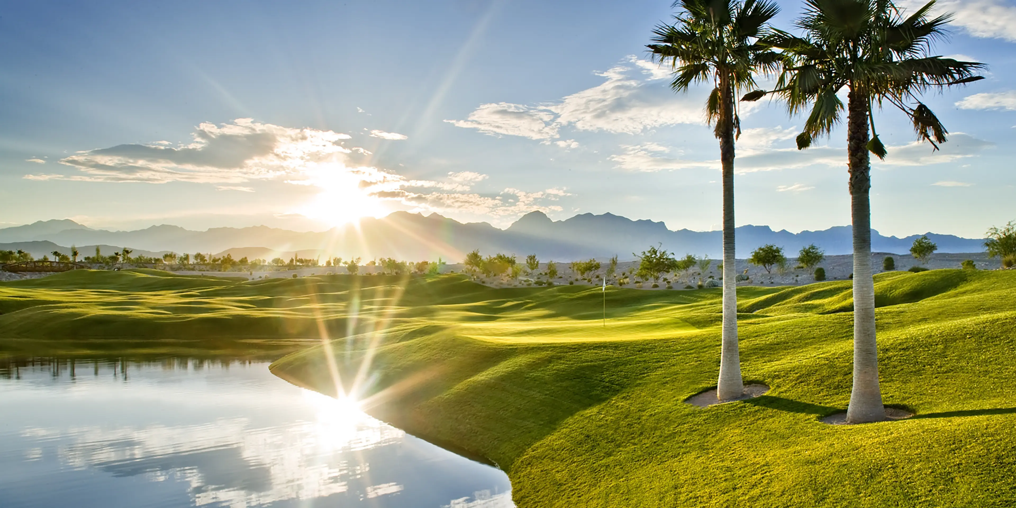 Landscape putting greens and fairway photo of the Coyote Springs Golf Club golf course