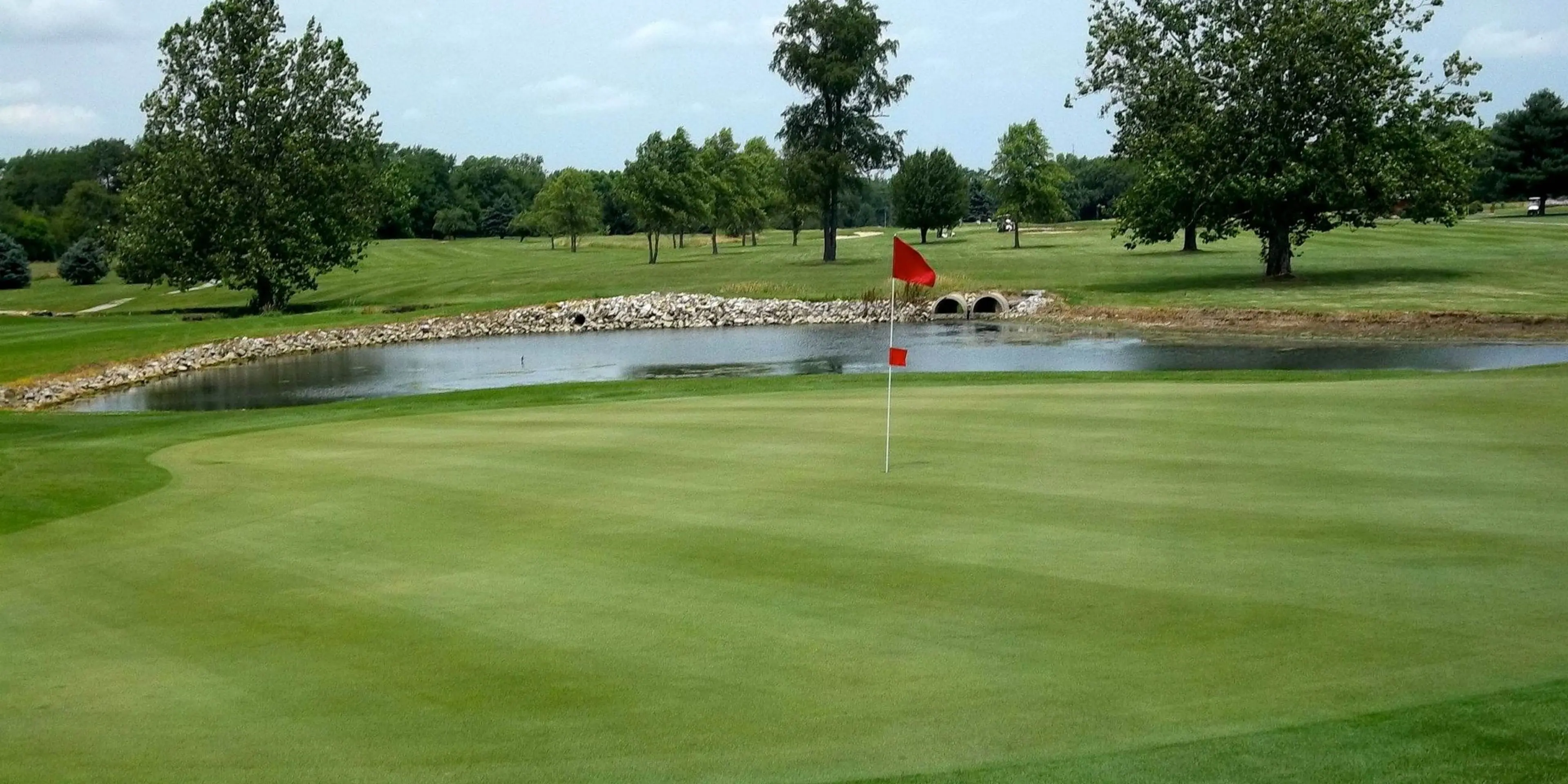 Landscape putting greens and fairway photo of the Crawfordsville Municipal Golf Course golf course