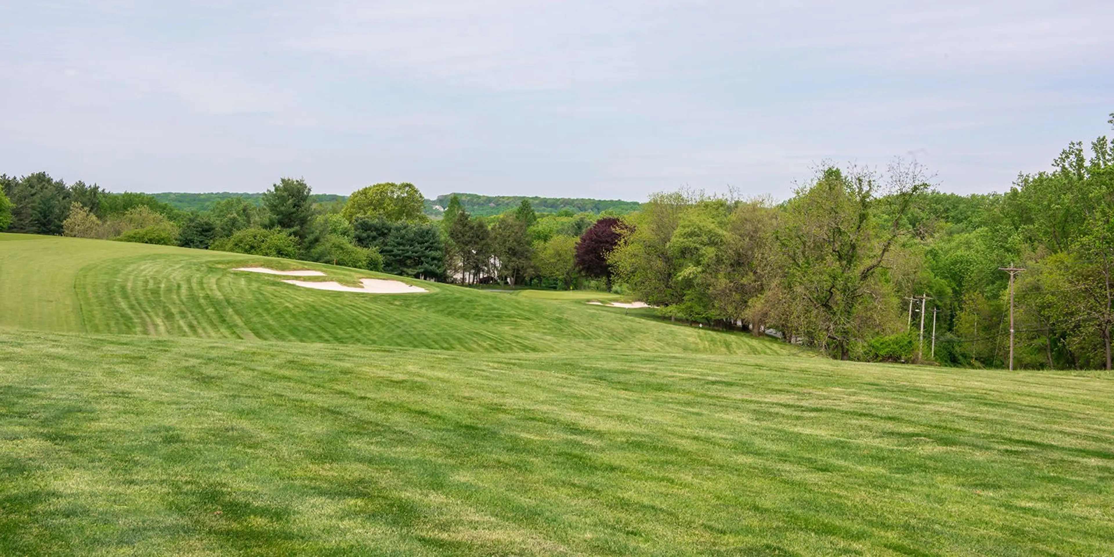 Landscape putting greens and fairway photo of the Deerfield Golf Club golf course
