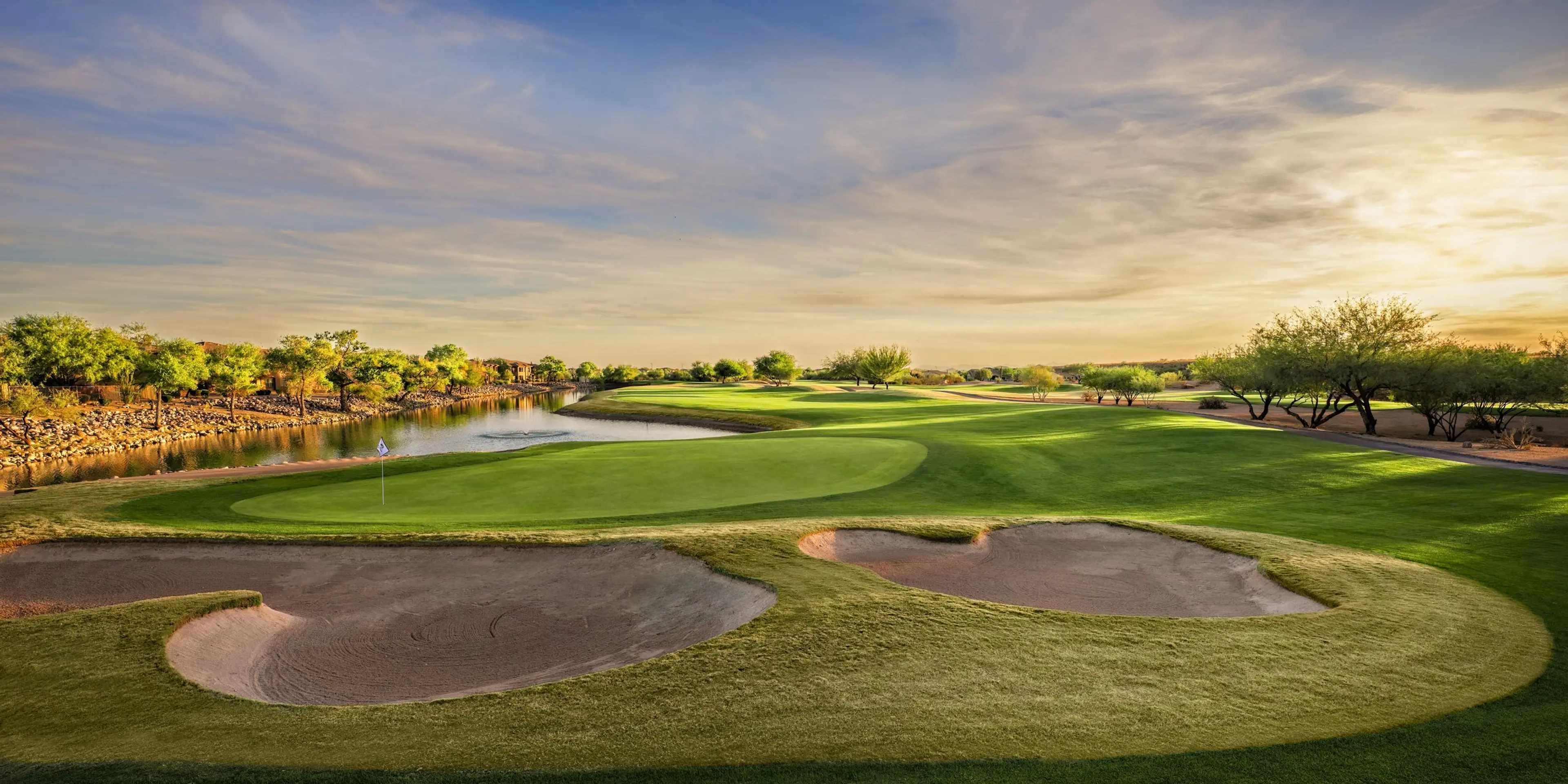 Landscape putting greens and fairway photo of the Dove Valley Ranch Golf Club golf course