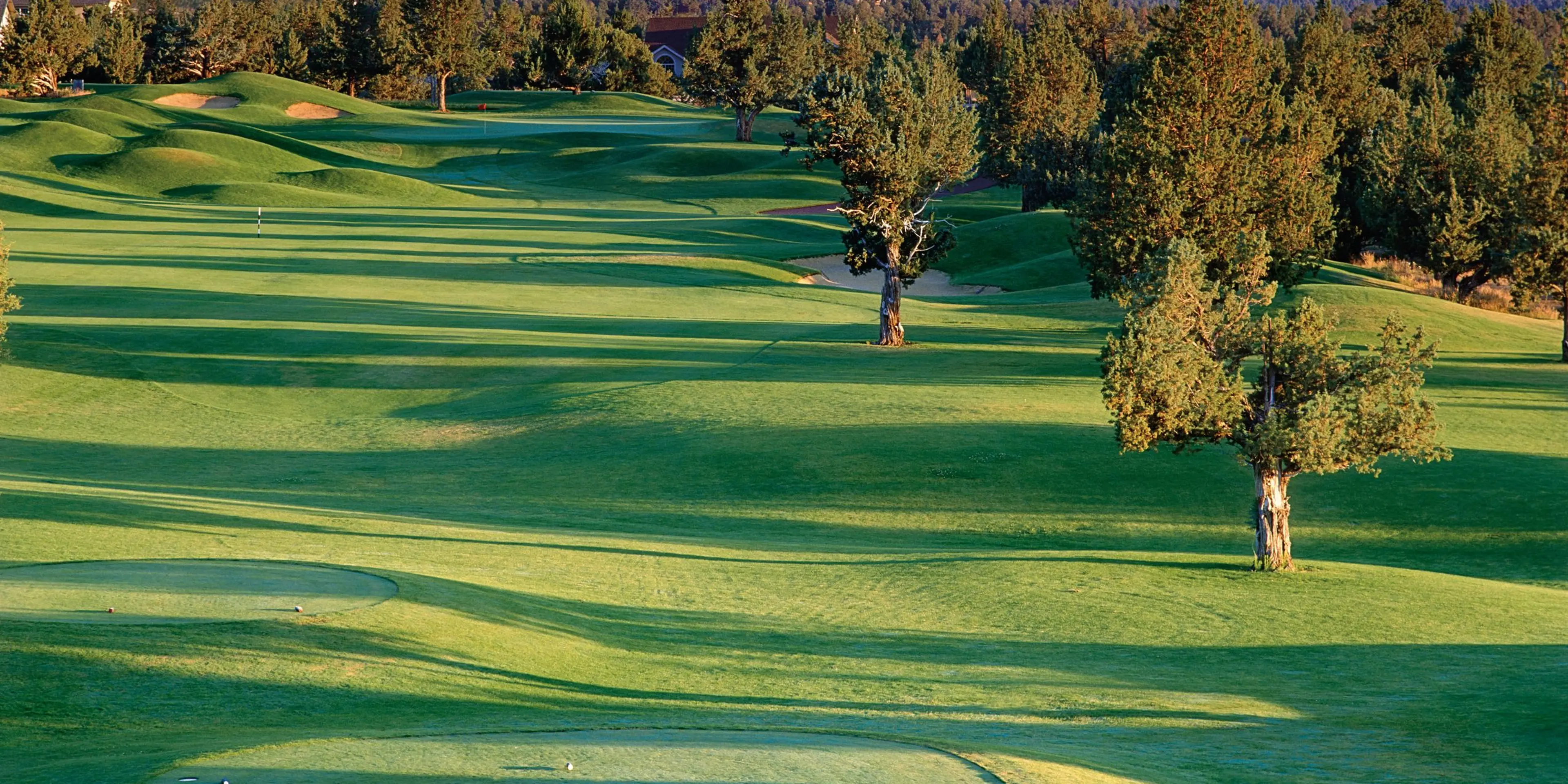 Landscape putting greens and fairway photo of the Eagle Crest Resort golf course
