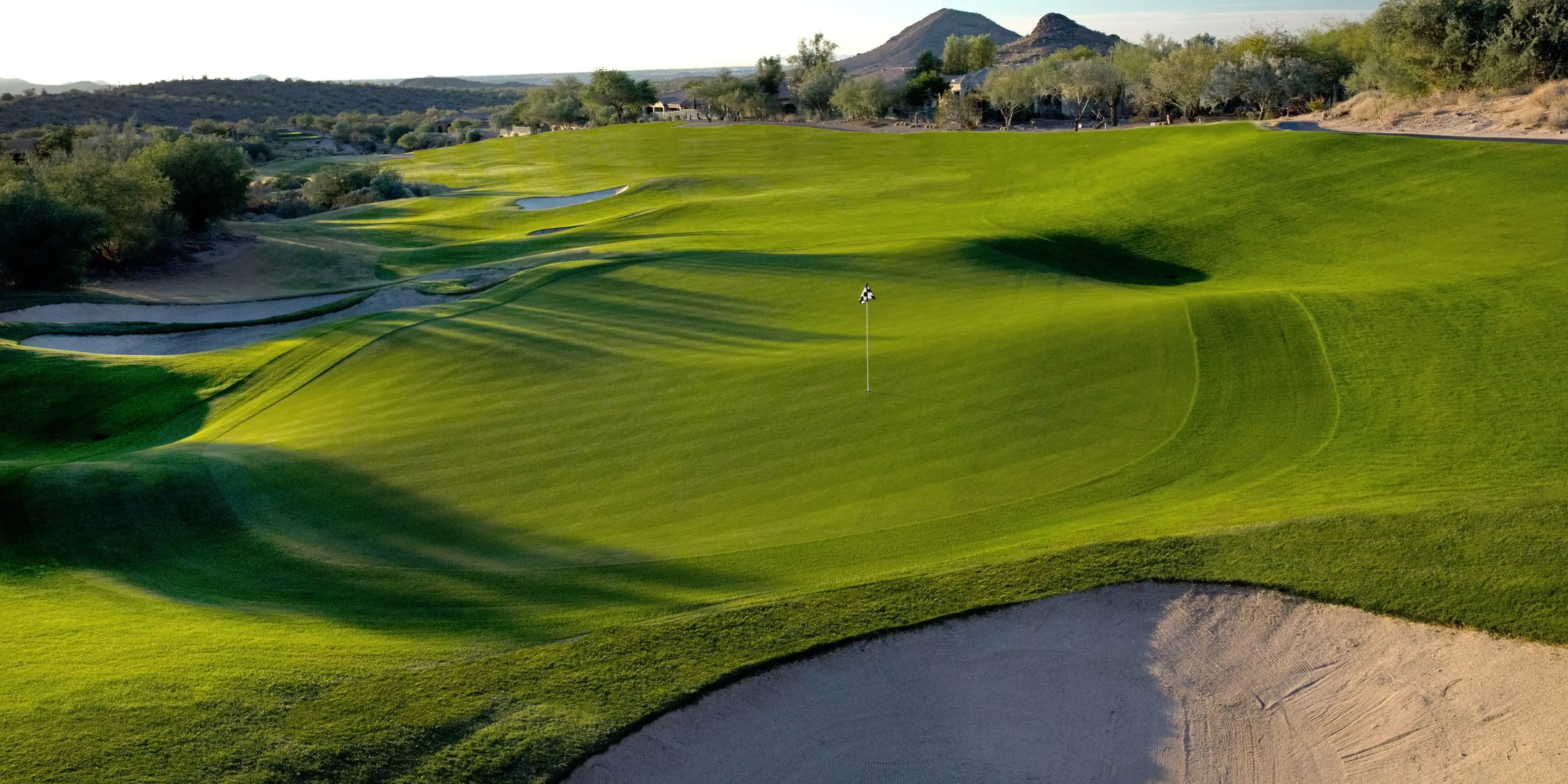 Landscape putting greens and fairway photo of the Eagle Mountain Golf Club golf course