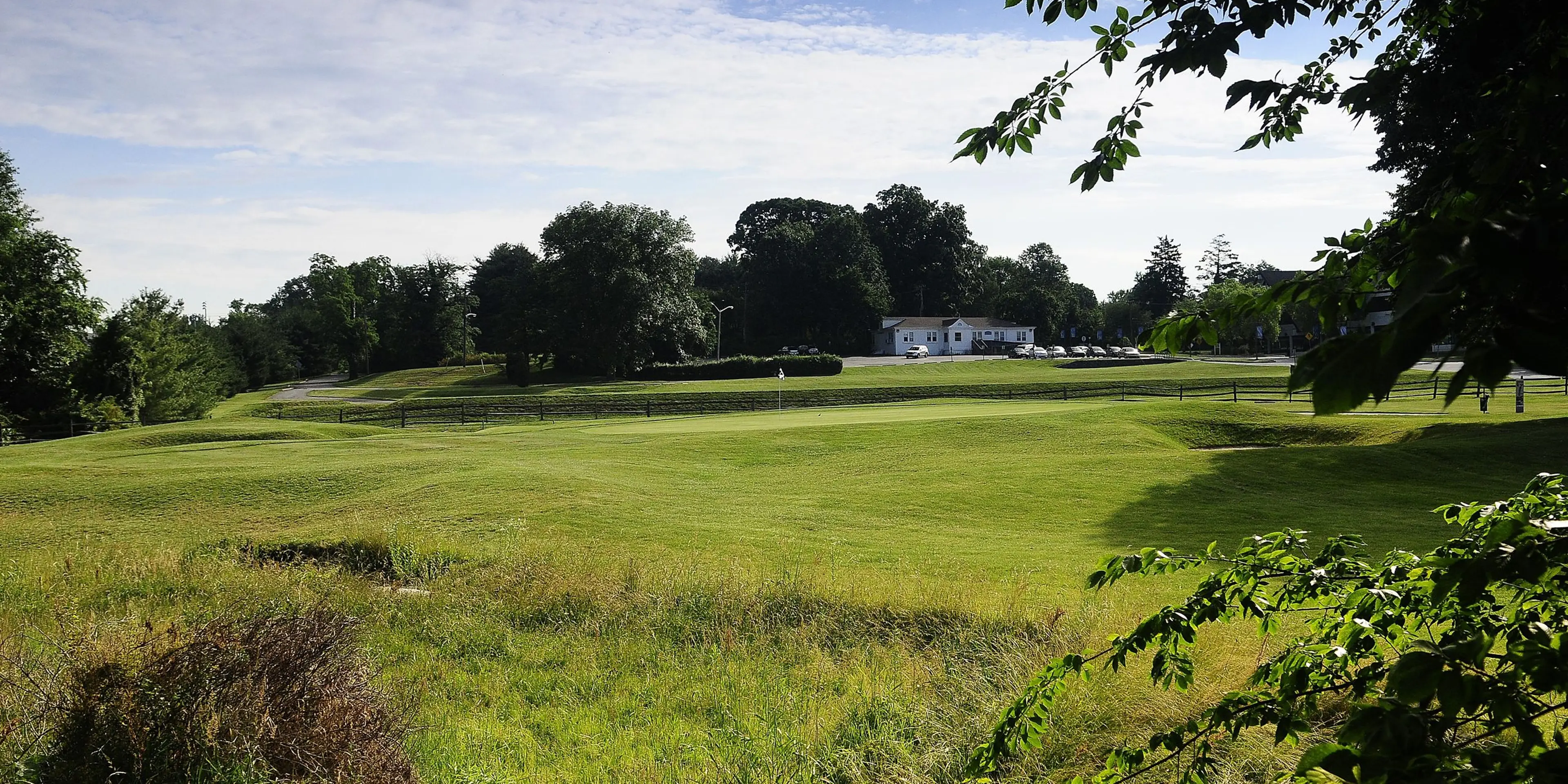 Landscape putting greens and fairway photo of the Ed Oliver Golf Club golf course
