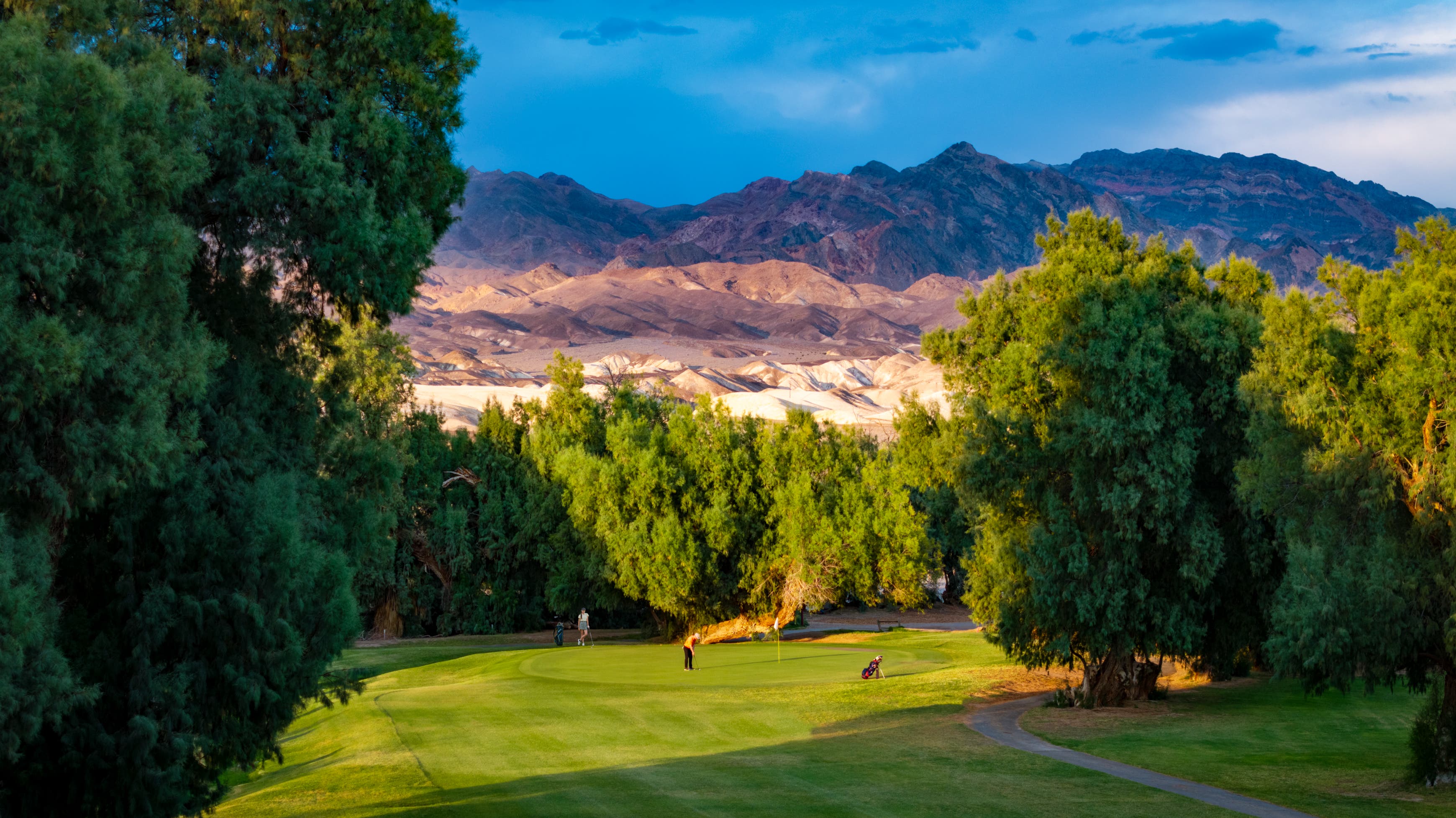 Landscape putting greens and fairway photo of the Furnace Creek Golf Course golf course