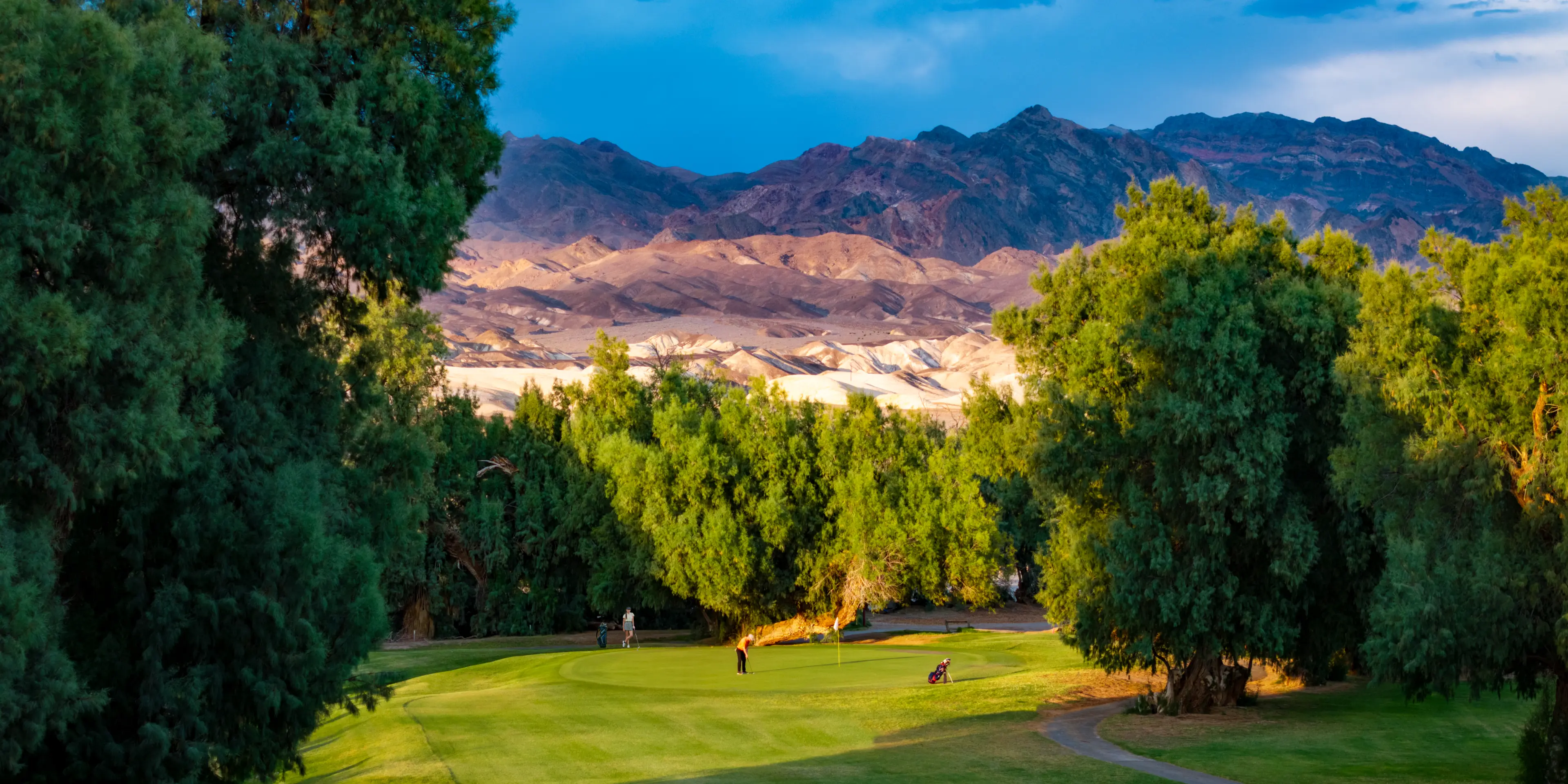 Landscape putting greens and fairway photo of the Furnace Creek Golf Course golf course