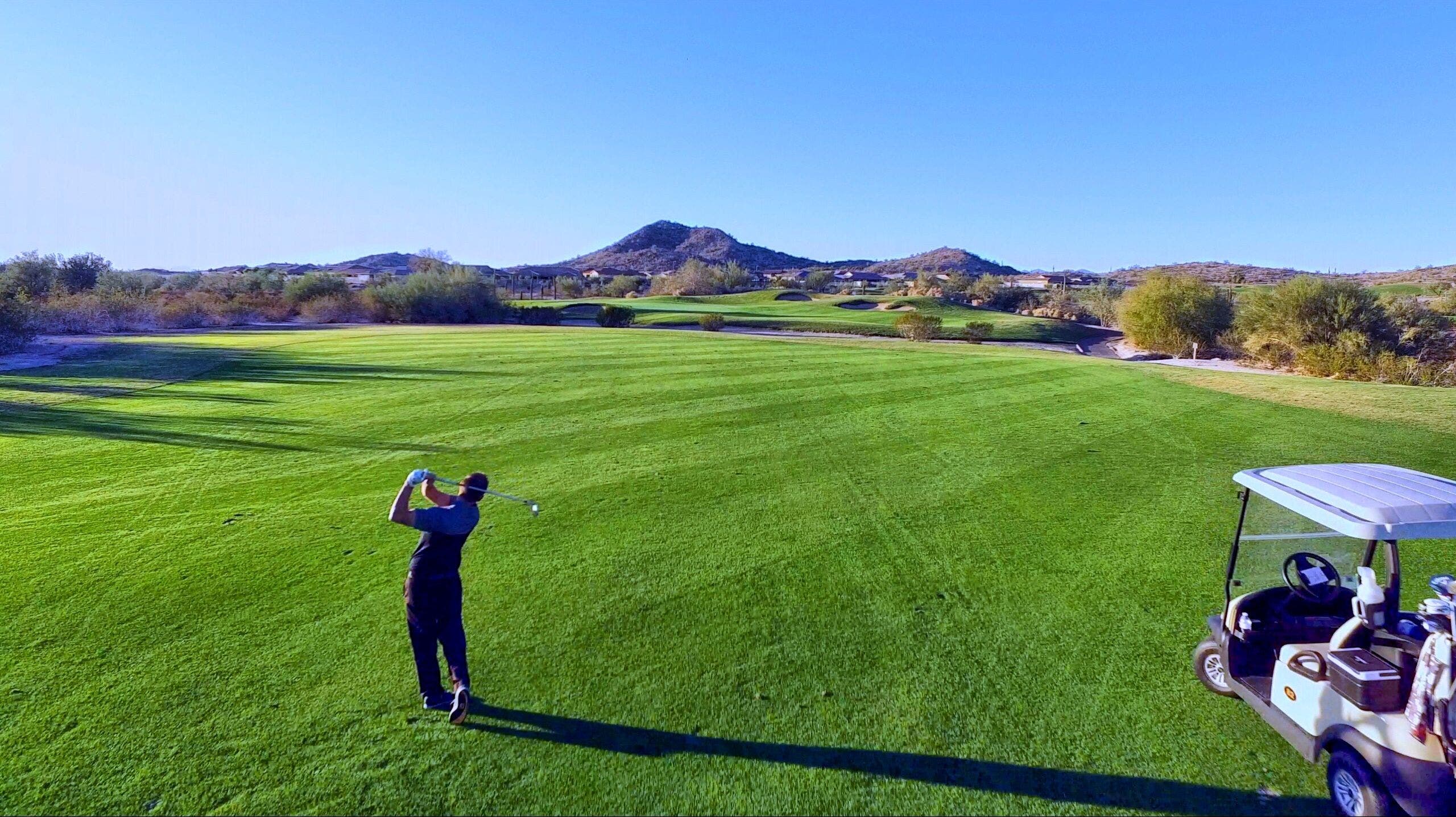 Landscape putting greens and fairway photo of the Golf Club of Estrella golf course