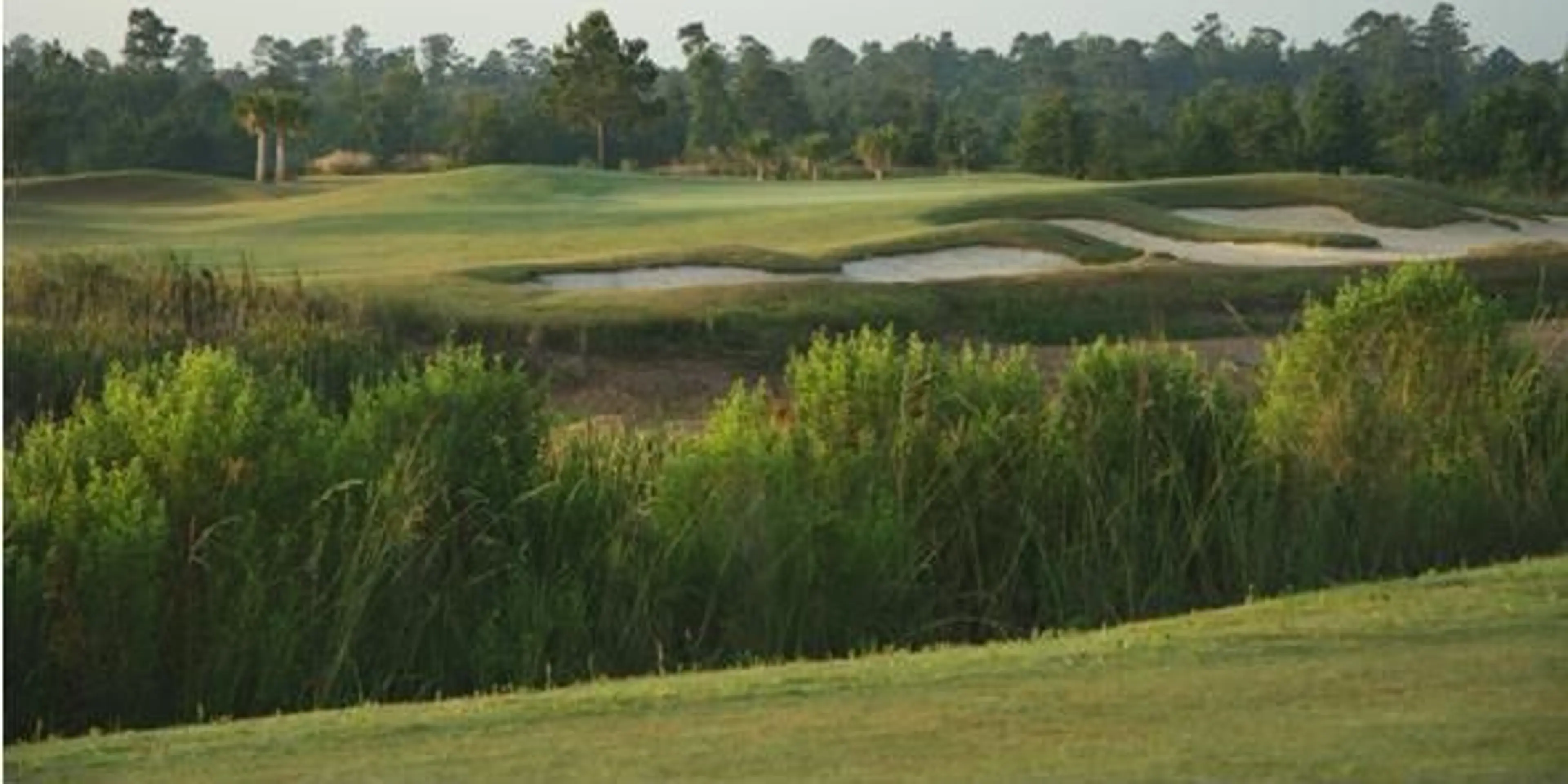 Landscape putting greens and fairway photo of the Grand Lake Golf Club golf course