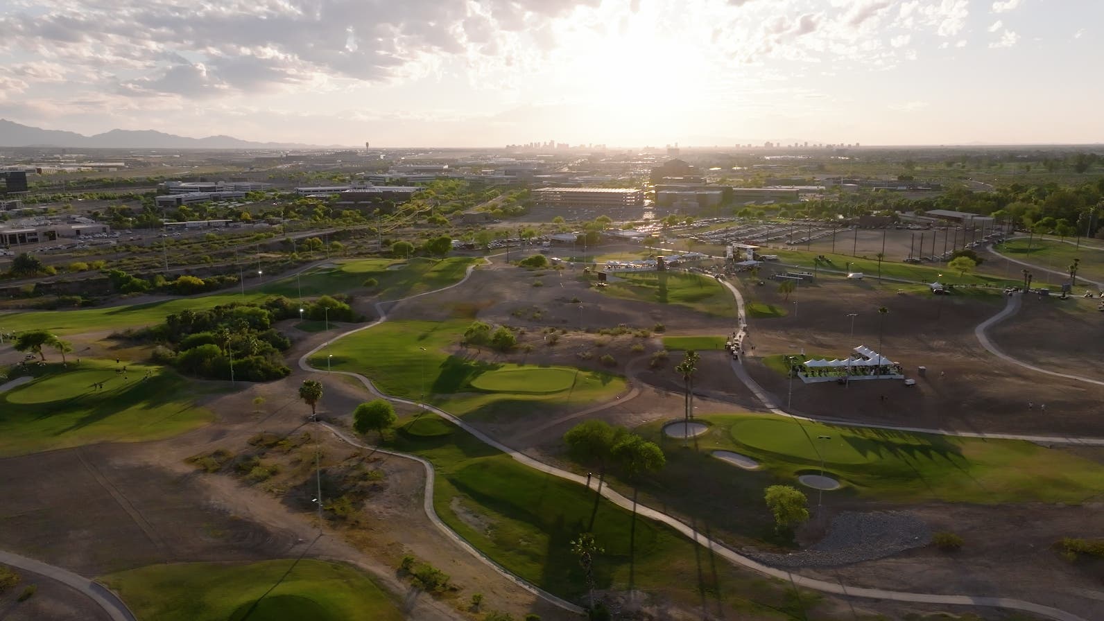 Landscape putting greens and fairway photo of the Grass Clippings Rolling Hills golf course