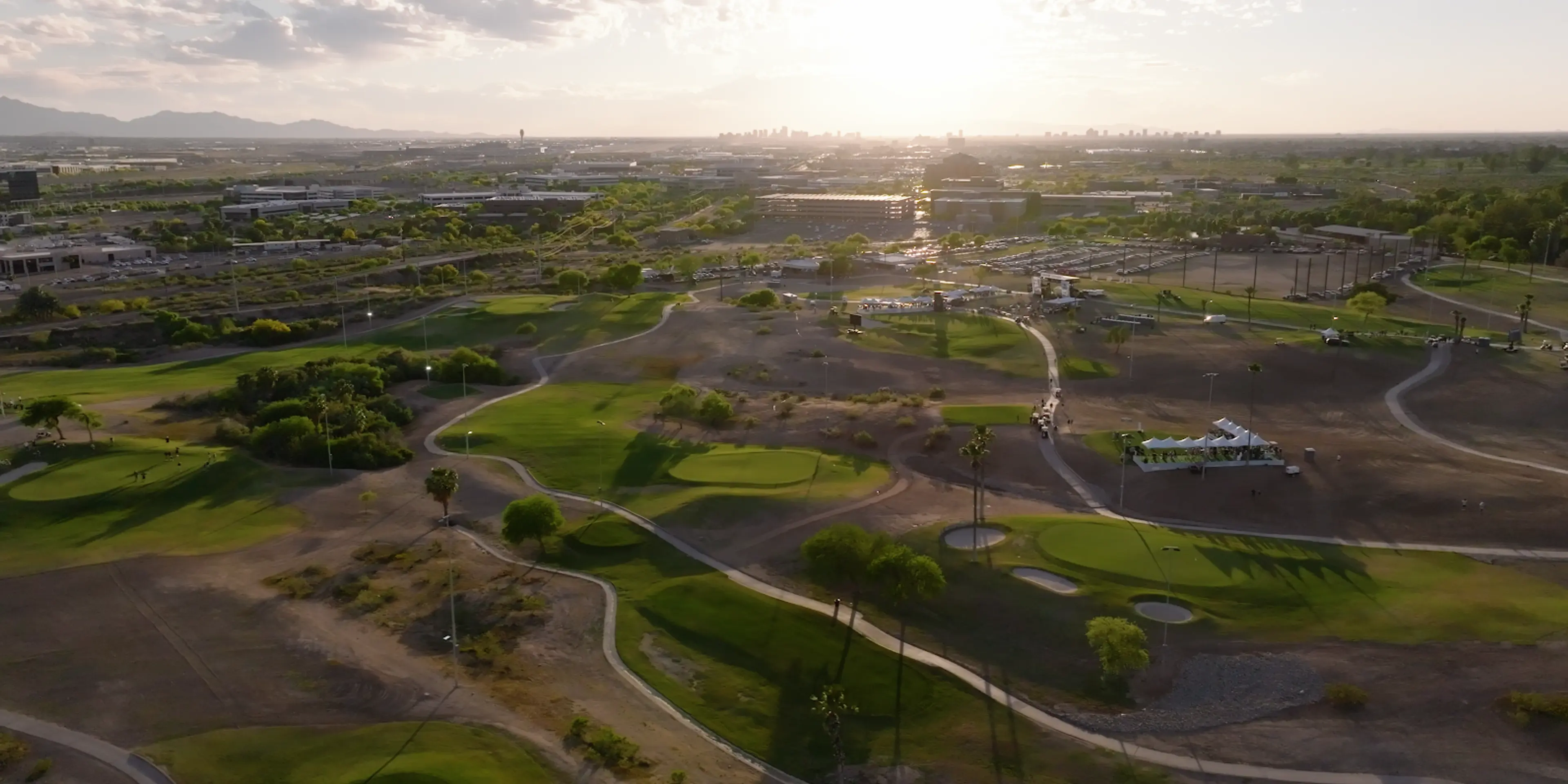 Landscape putting greens and fairway photo of the Grass Clippings Rolling Hills golf course
