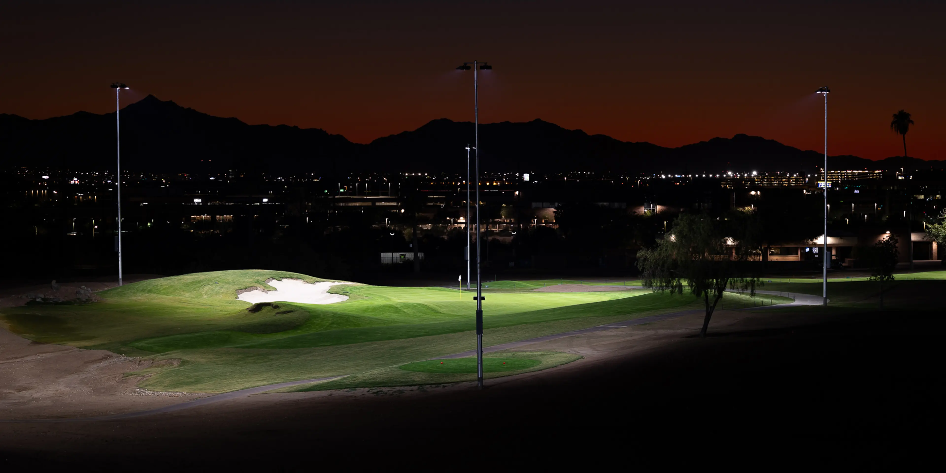 Landscape putting greens and fairway photo of the Grass Clippings Rolling Hills golf course